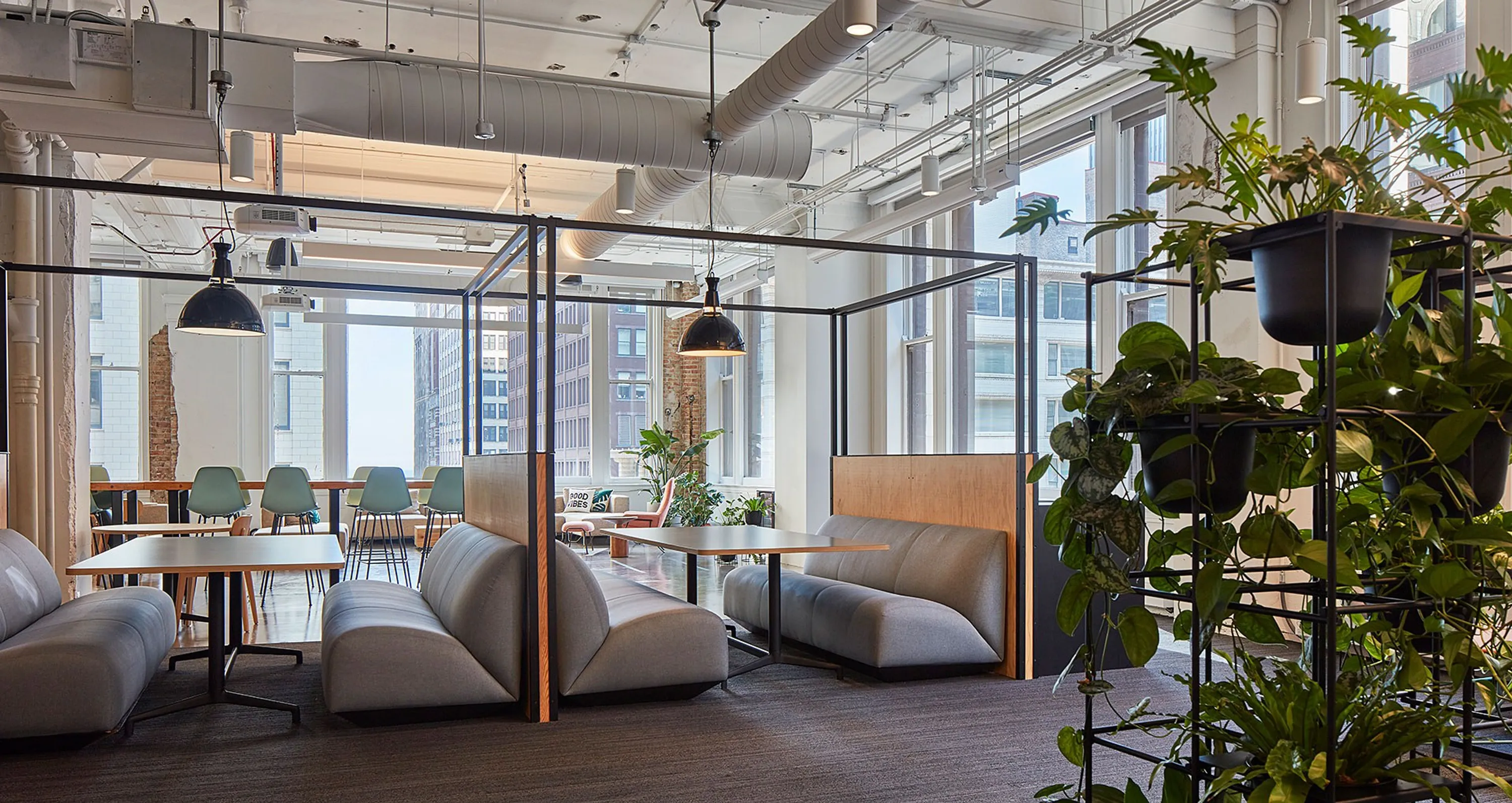 custom space divider with steel tube frame & plywood infill by Icon Modern