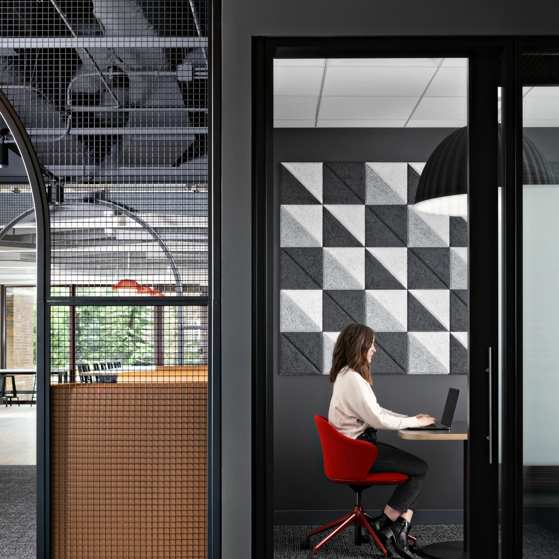 Custom arched steel tube space dividers + wire mesh infill by Icon Modern