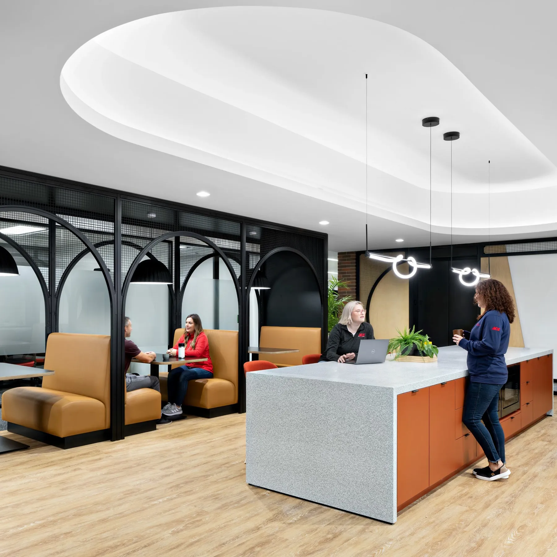 custom arched steel booth surrounds + wire mesh infill by Icon Modern