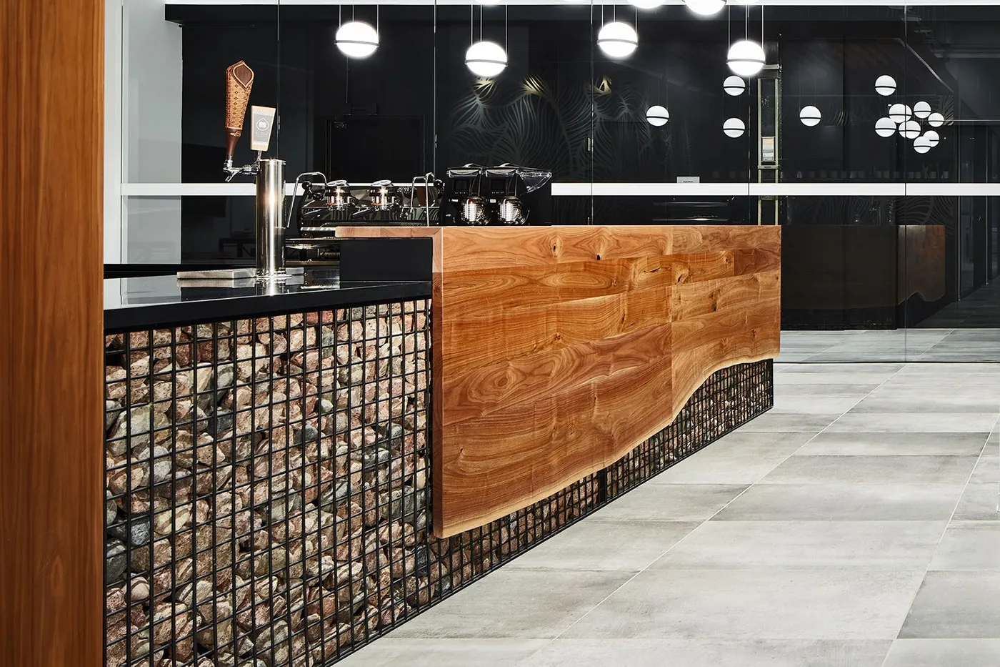 custom counter top and accent panel in walnut by Icon Modern