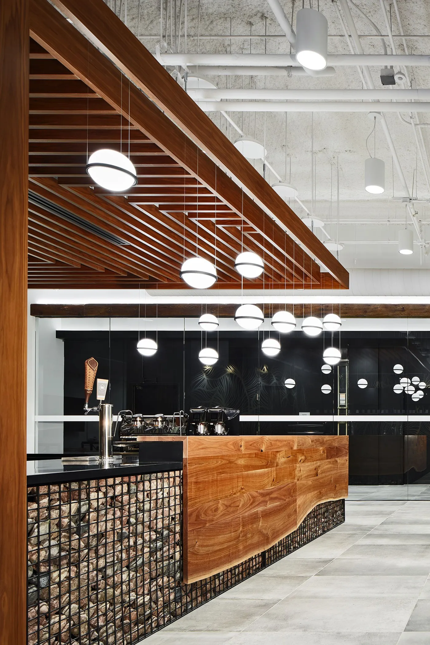 custom counter top and accent panel in walnut by Icon Modern