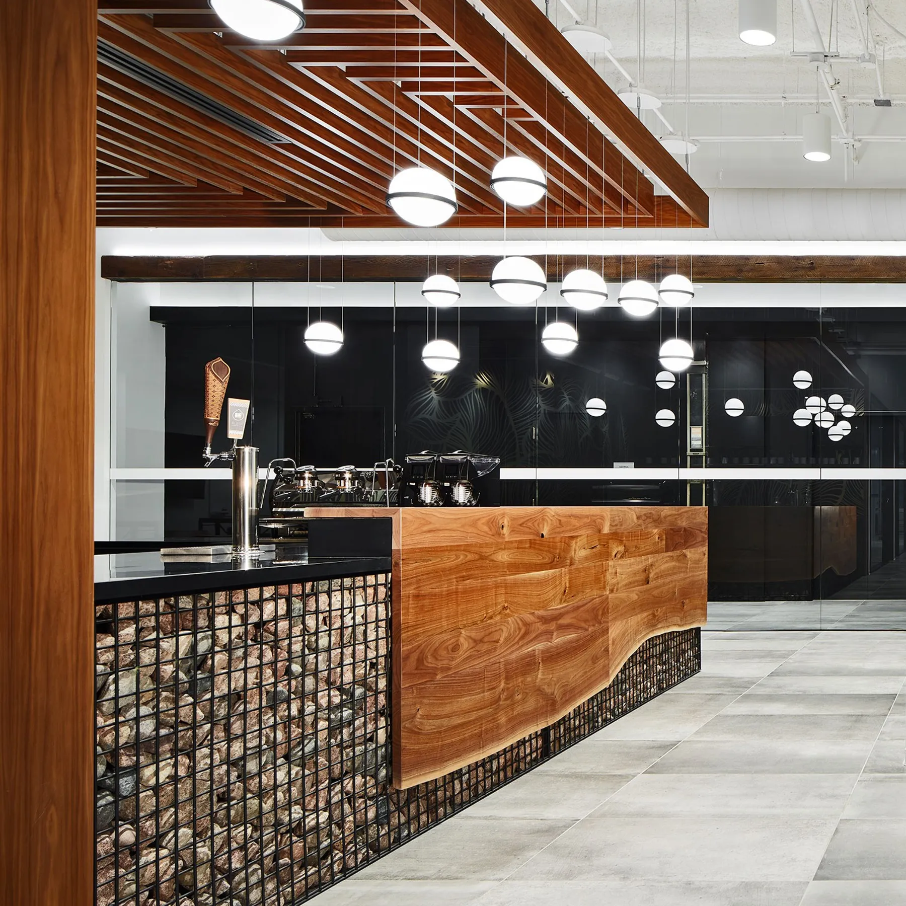 custom counter top and accent panel in walnut by Icon Modern
