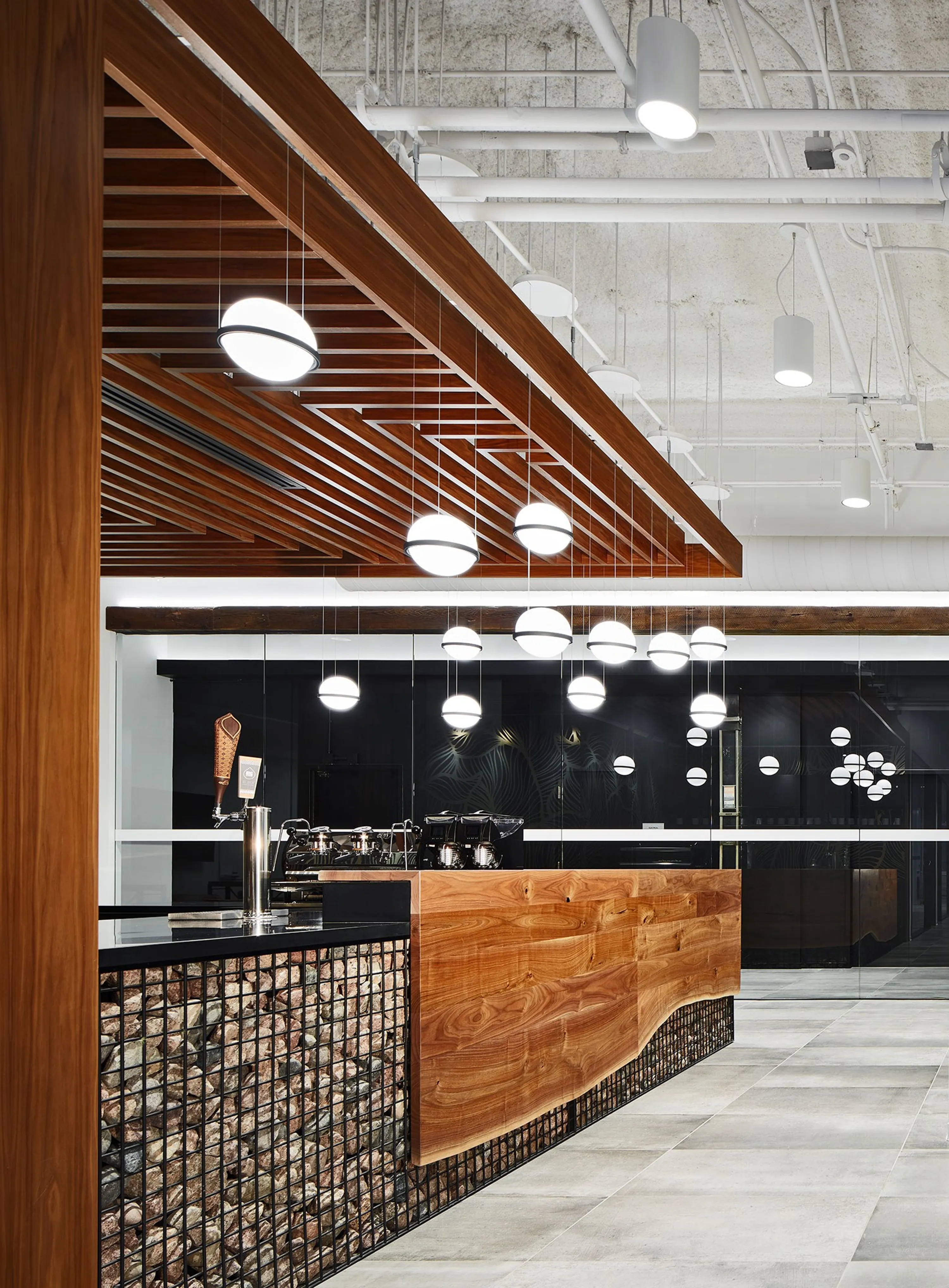 custom counter top and accent panel in walnut by Icon Modern