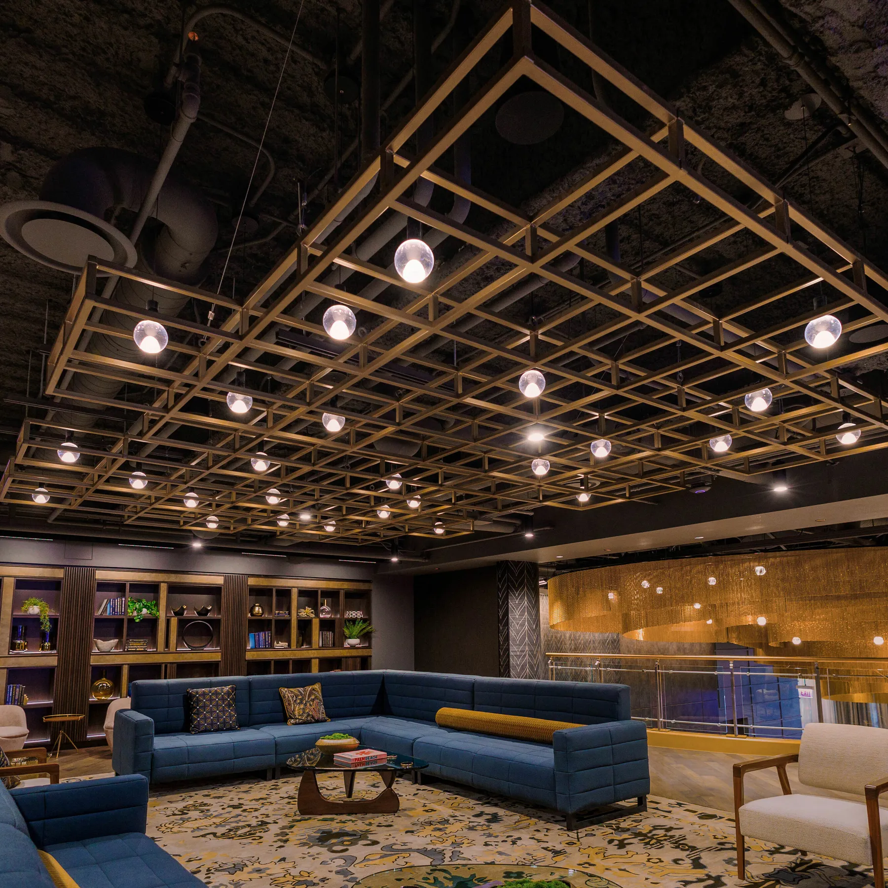 custom ceiling element with steel tube grid and brass color powdercoat by Icon Modern