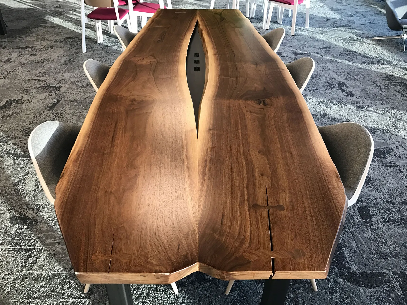 custom conference table with center power strip by Icon Modern