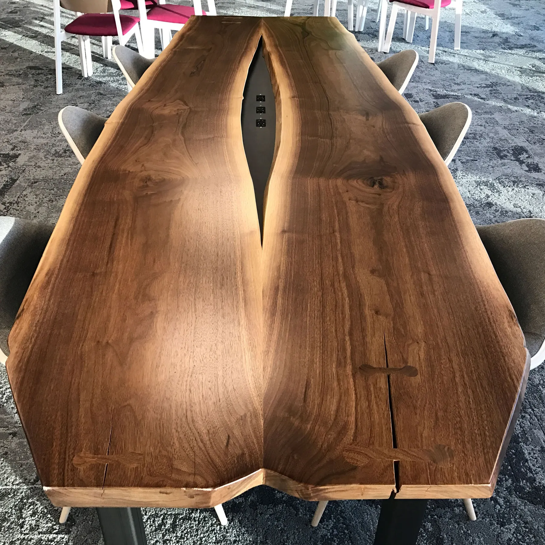 custom conference table with center power strip by Icon Modern