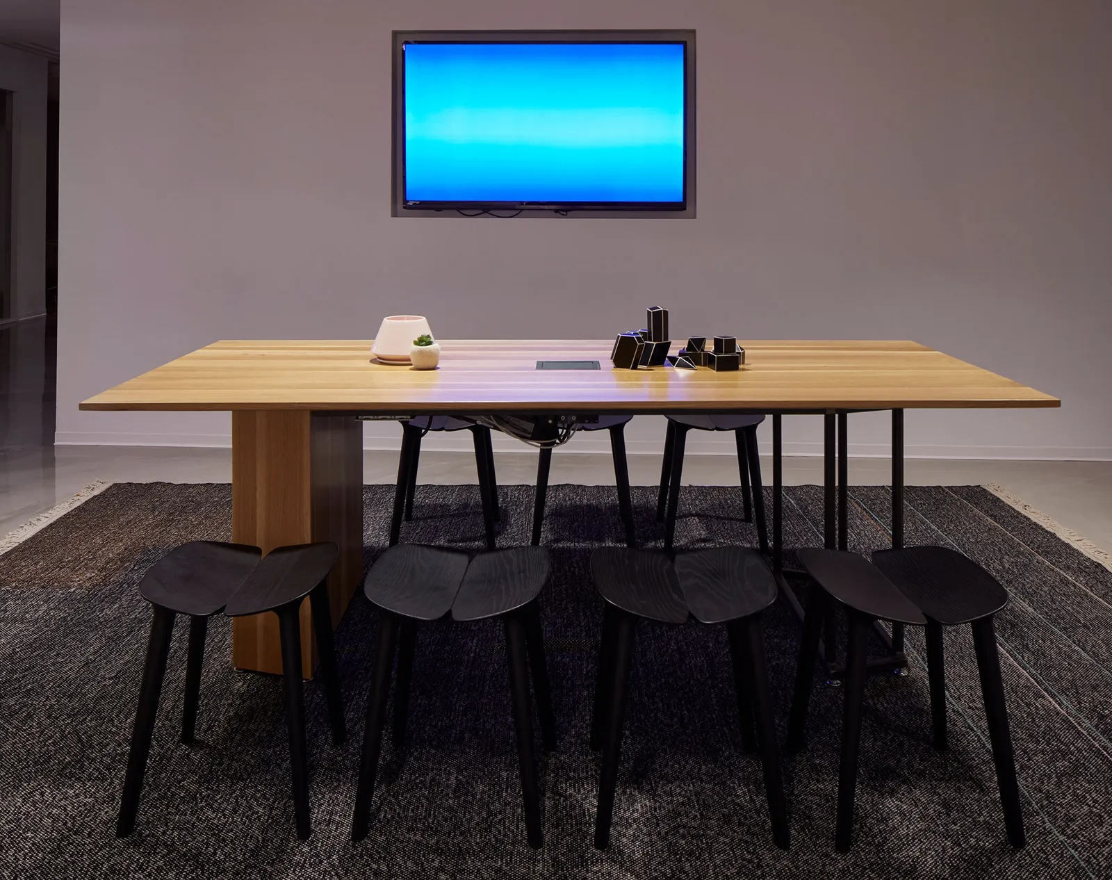 custom community table oak and steel base by Icon Modern