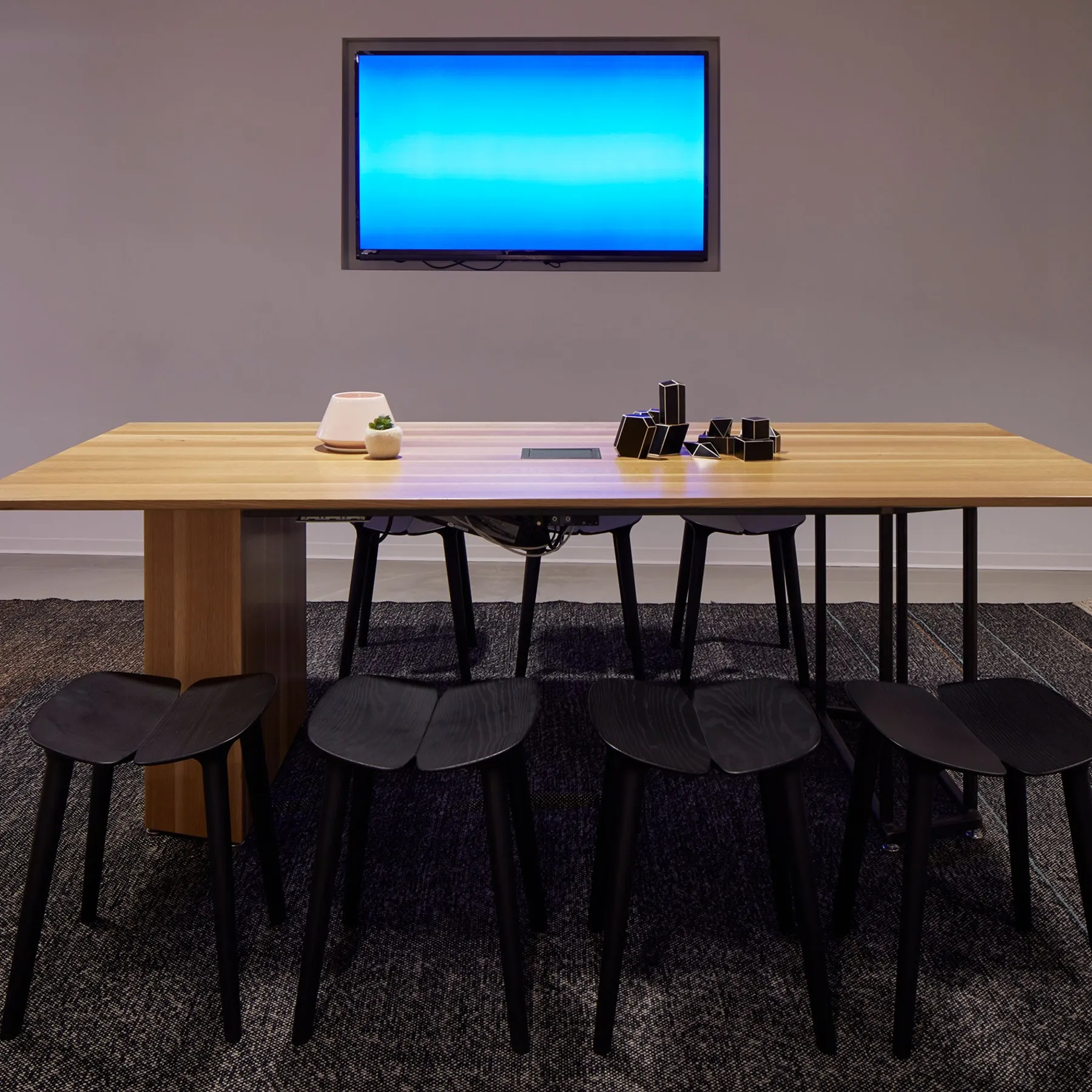 custom community table oak and steel base by Icon Modern