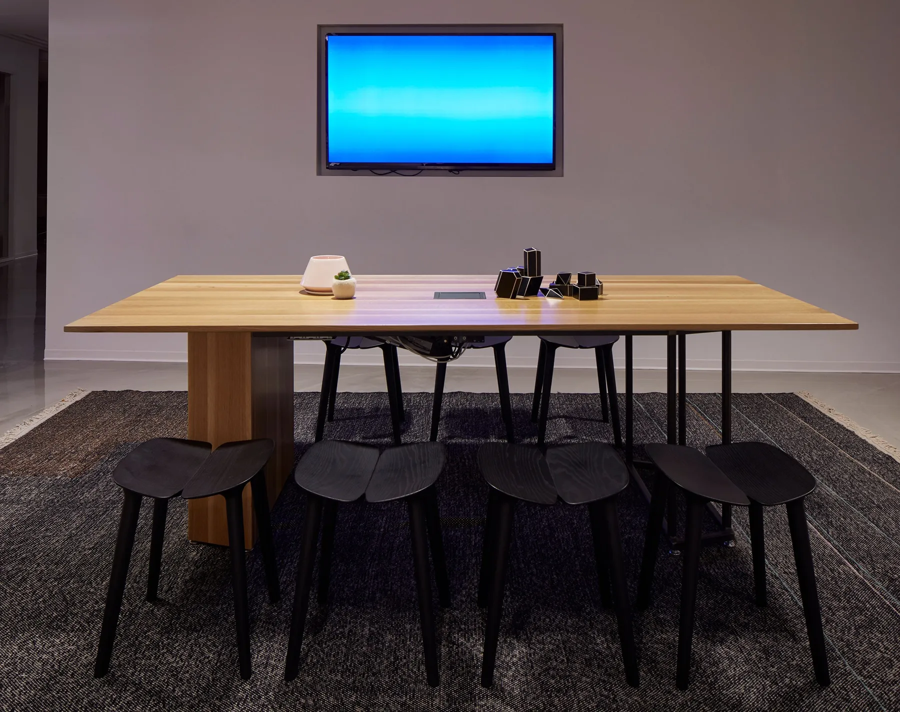 custom community table oak and steel base by Icon Modern