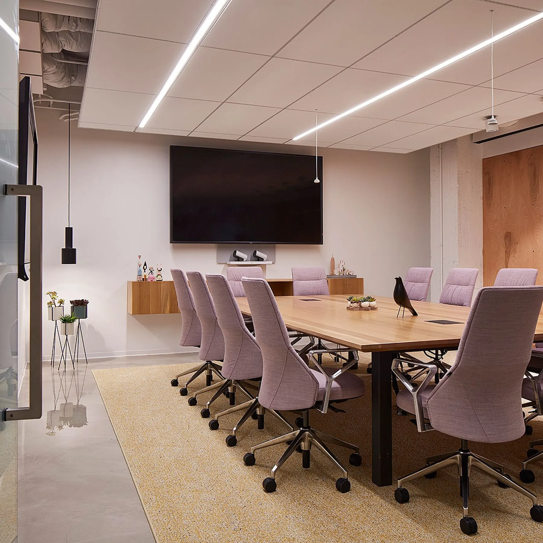 custom conference table oak with flip-up power integration by Icon Modern
