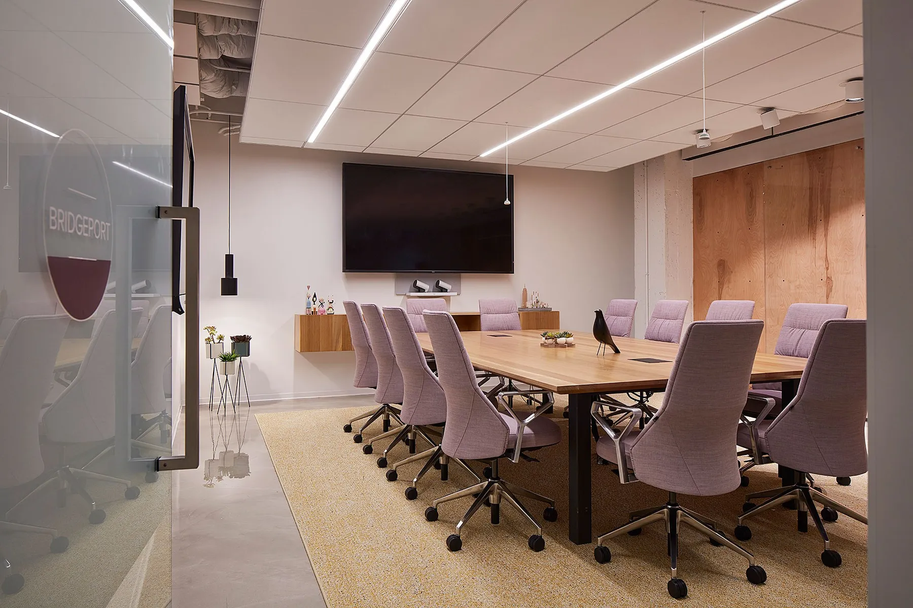 custom conference table oak with flip-up power integration by Icon Modern