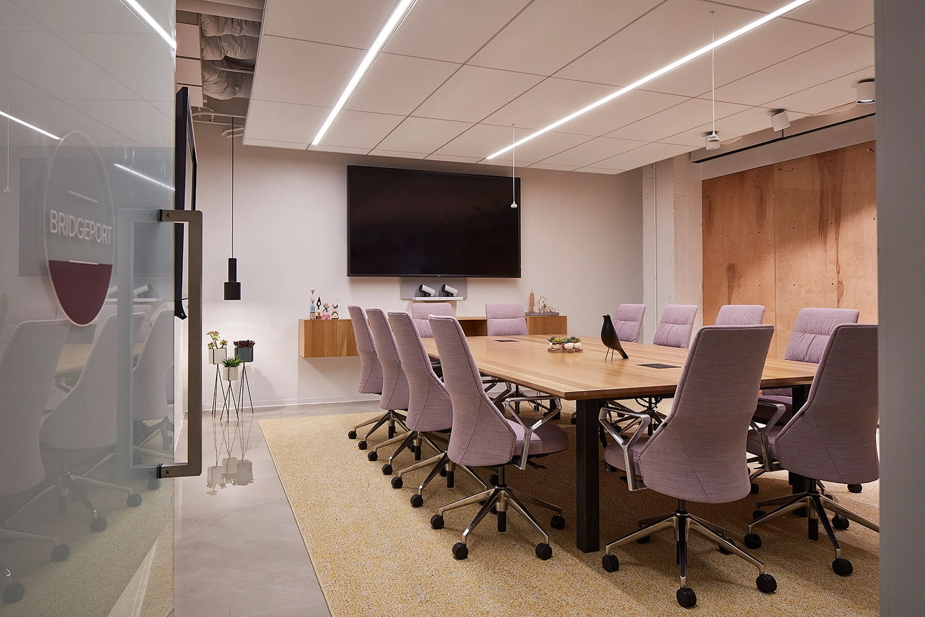 custom conference table oak with flip-up power integration by Icon Modern