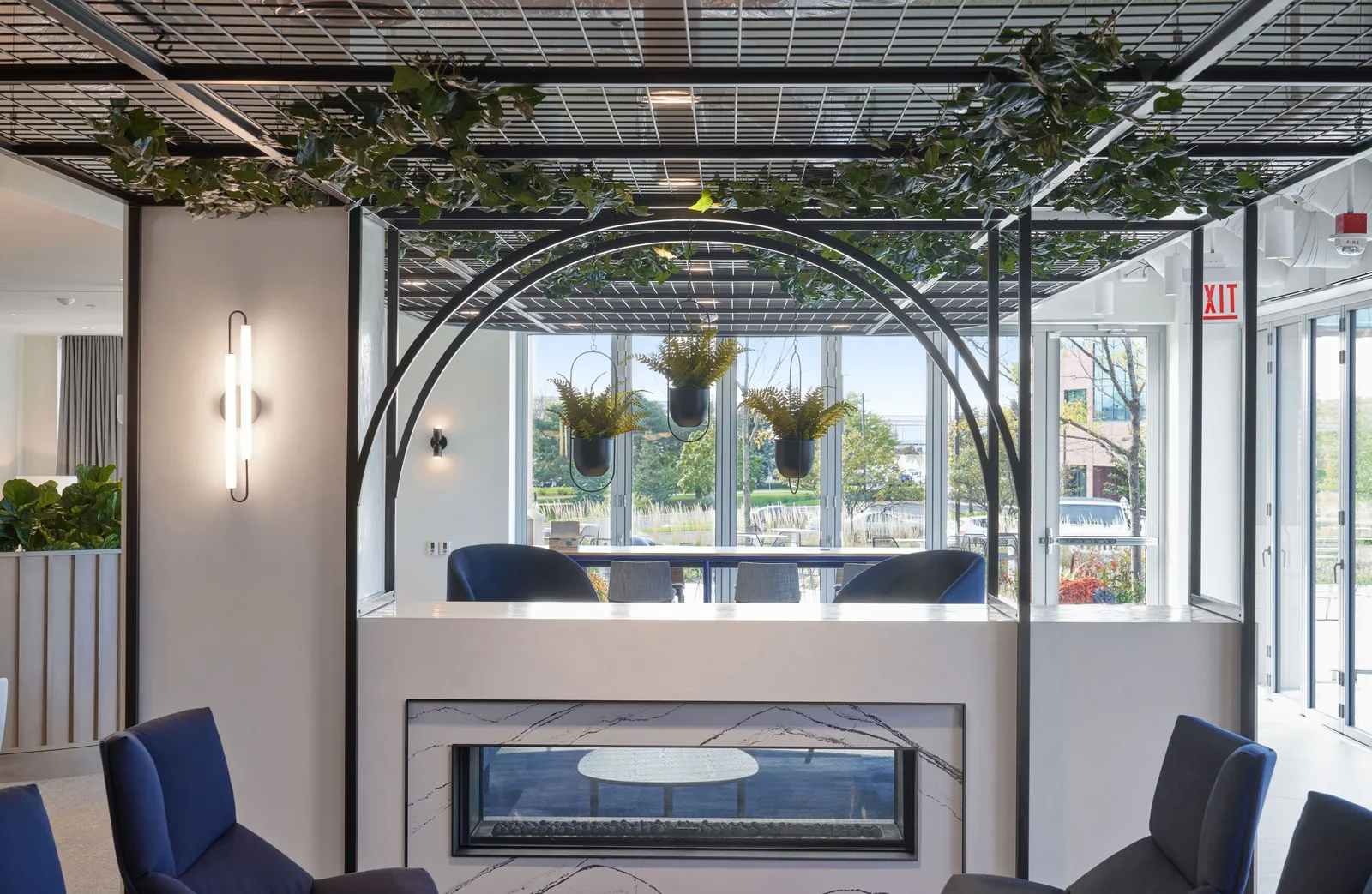 custom steel arches and fireplace surround by Icon Modern