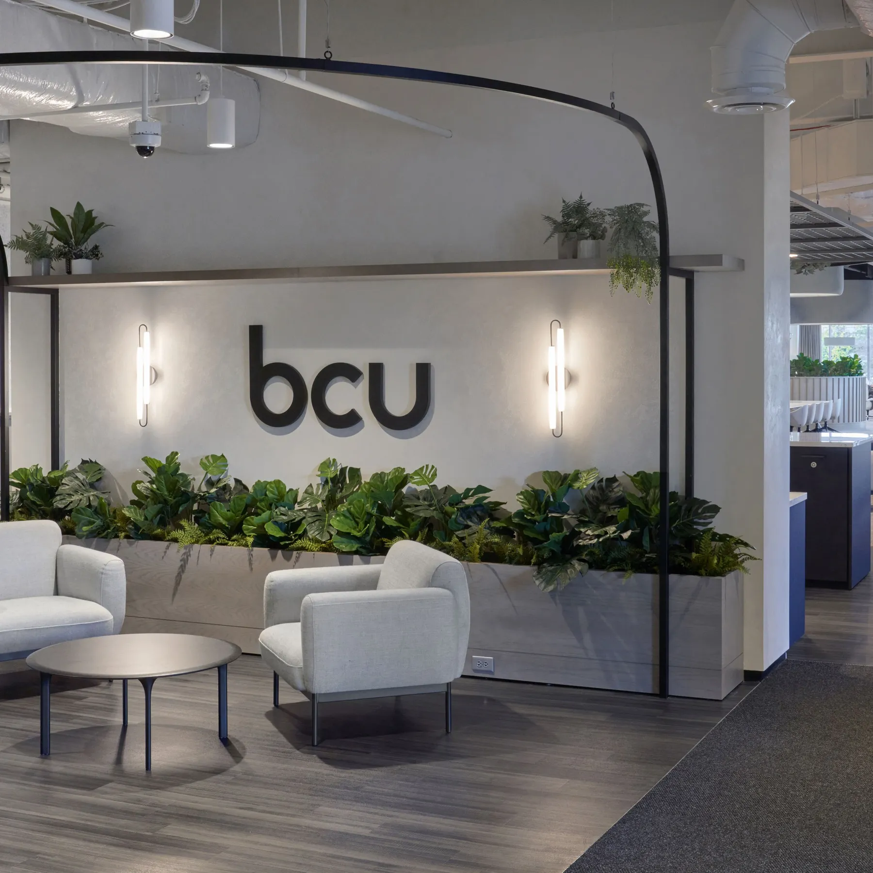 custom shelving support and decorative steel tube ceiling element by Icon Modern