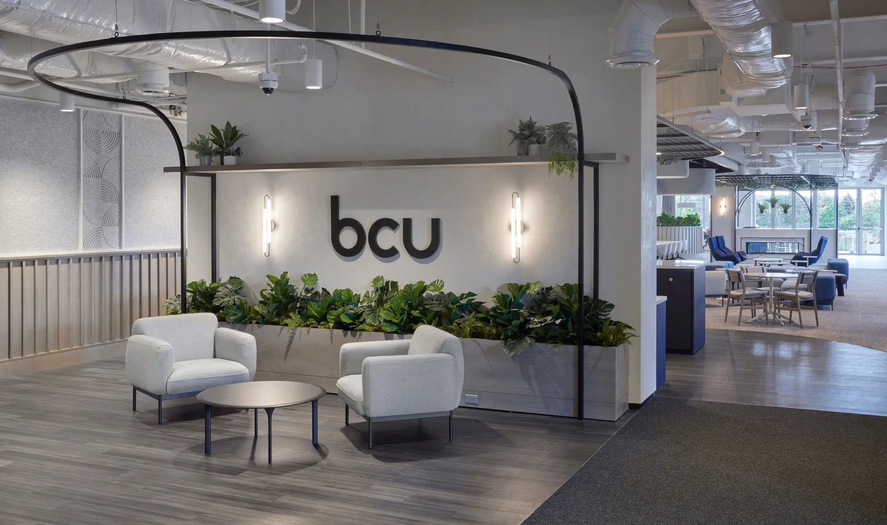 custom shelving support and decorative steel tube ceiling element by Icon Modern