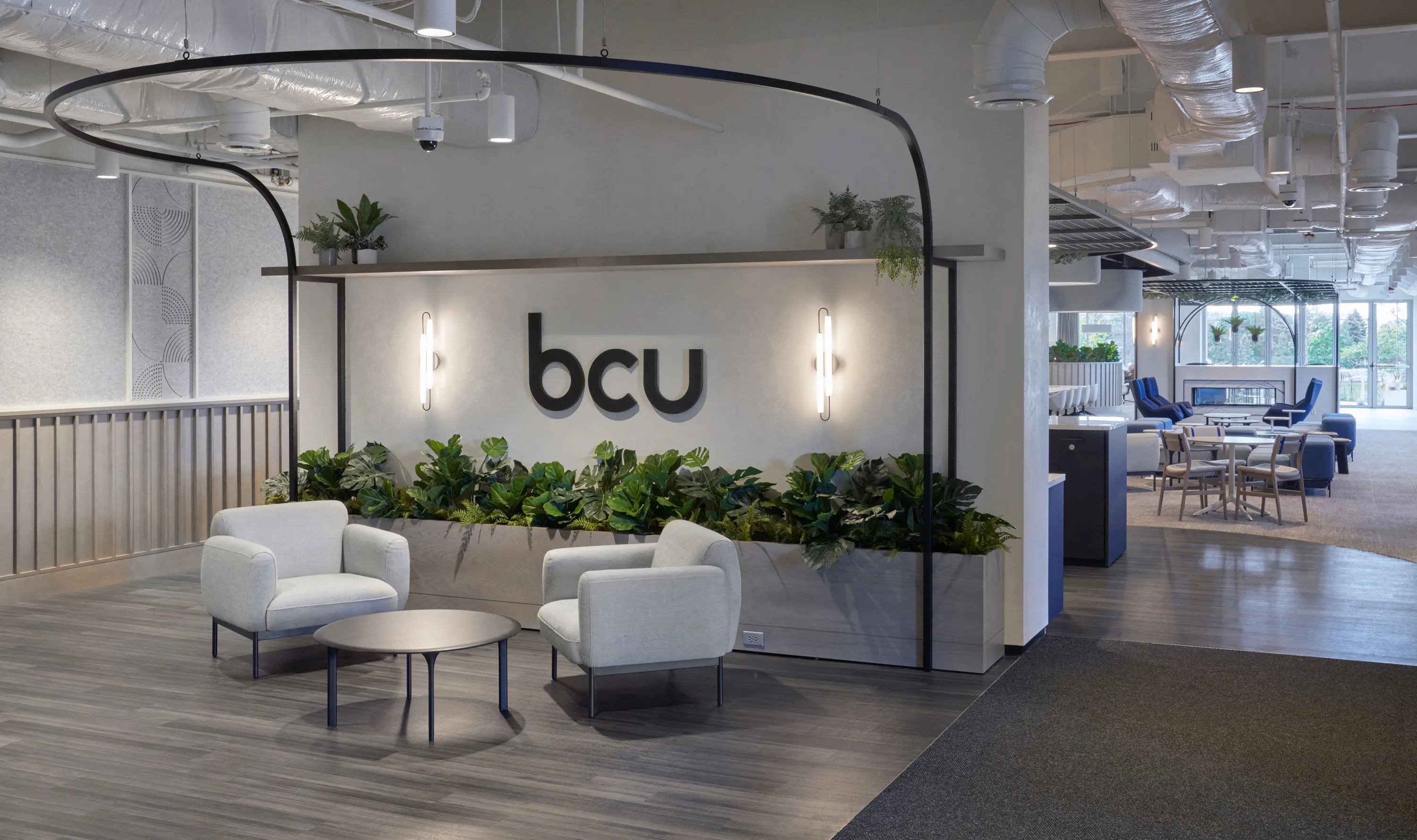 custom shelving support and decorative steel tube ceiling element by Icon Modern