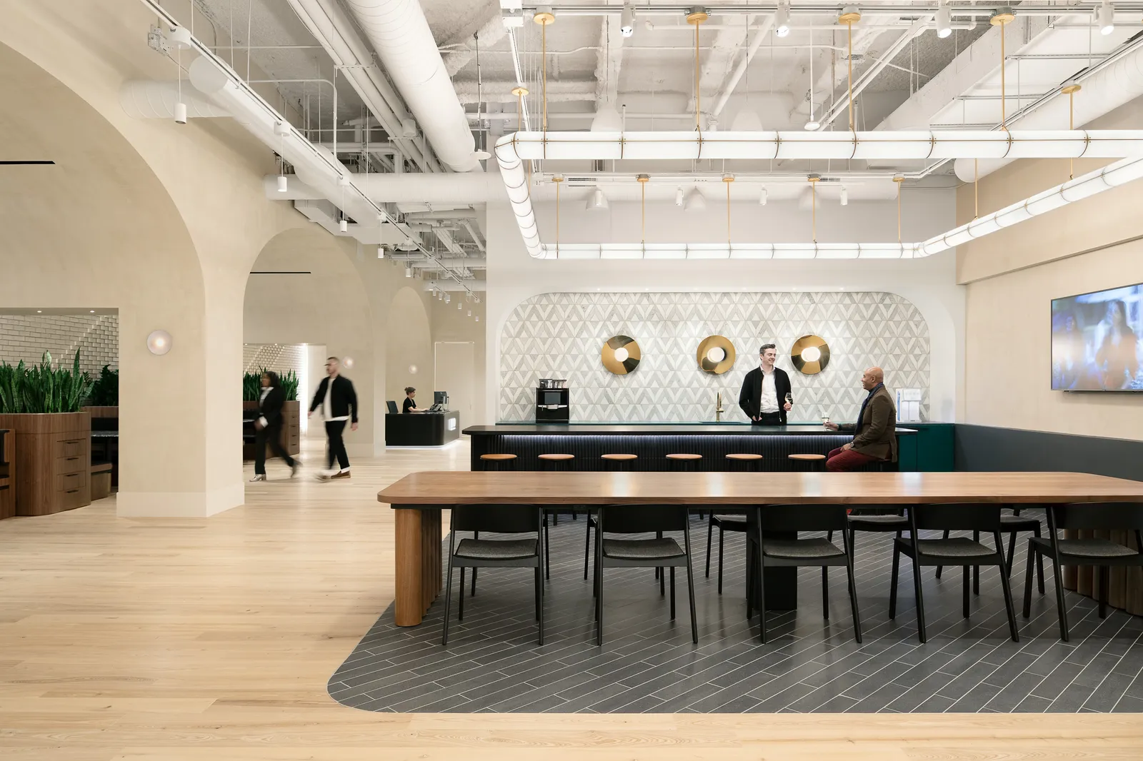 custom walnut veneer work table + multi-dowel panel base + power integration by Icon Modern