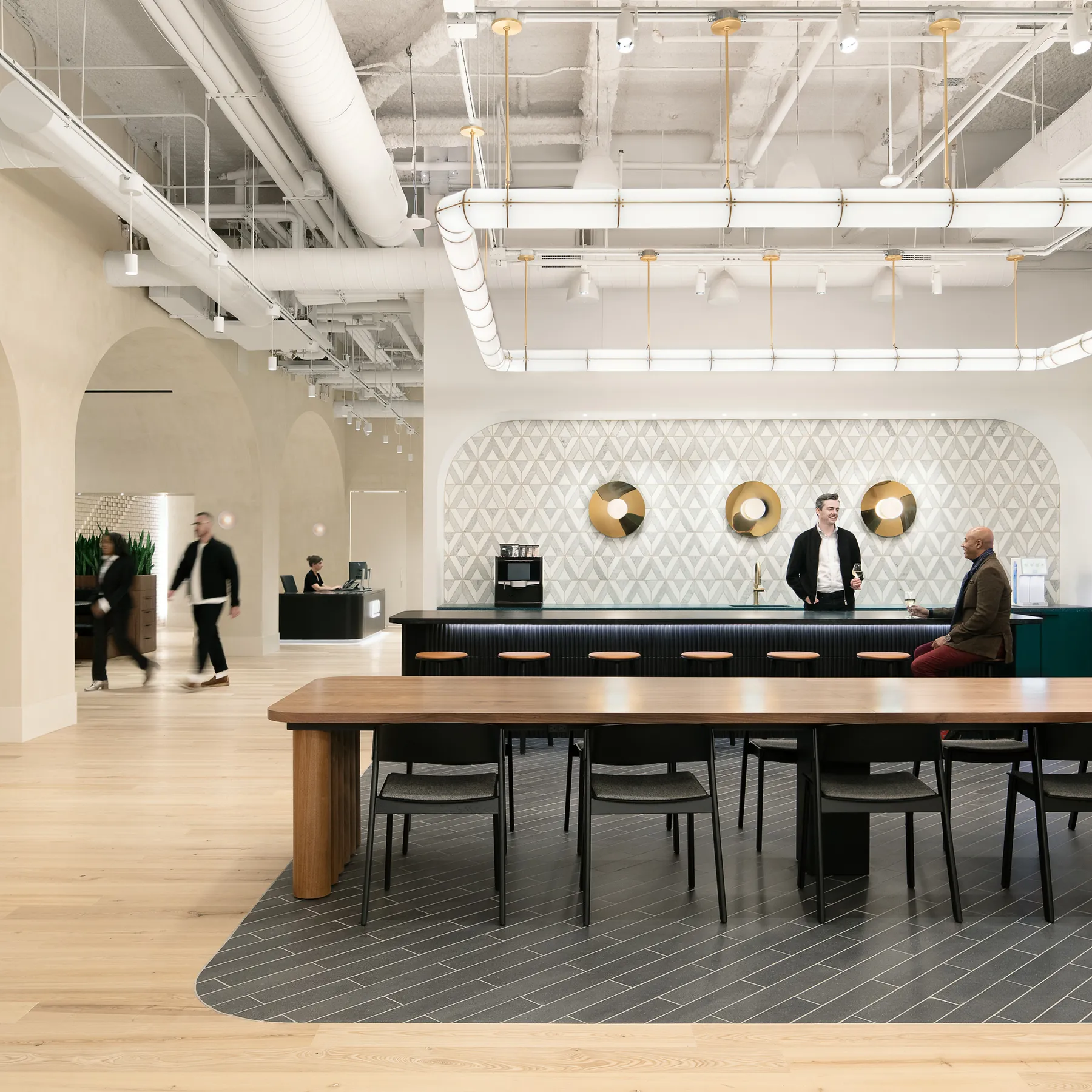 custom walnut veneer work table + multi-dowel panel base + power integration by Icon Modern