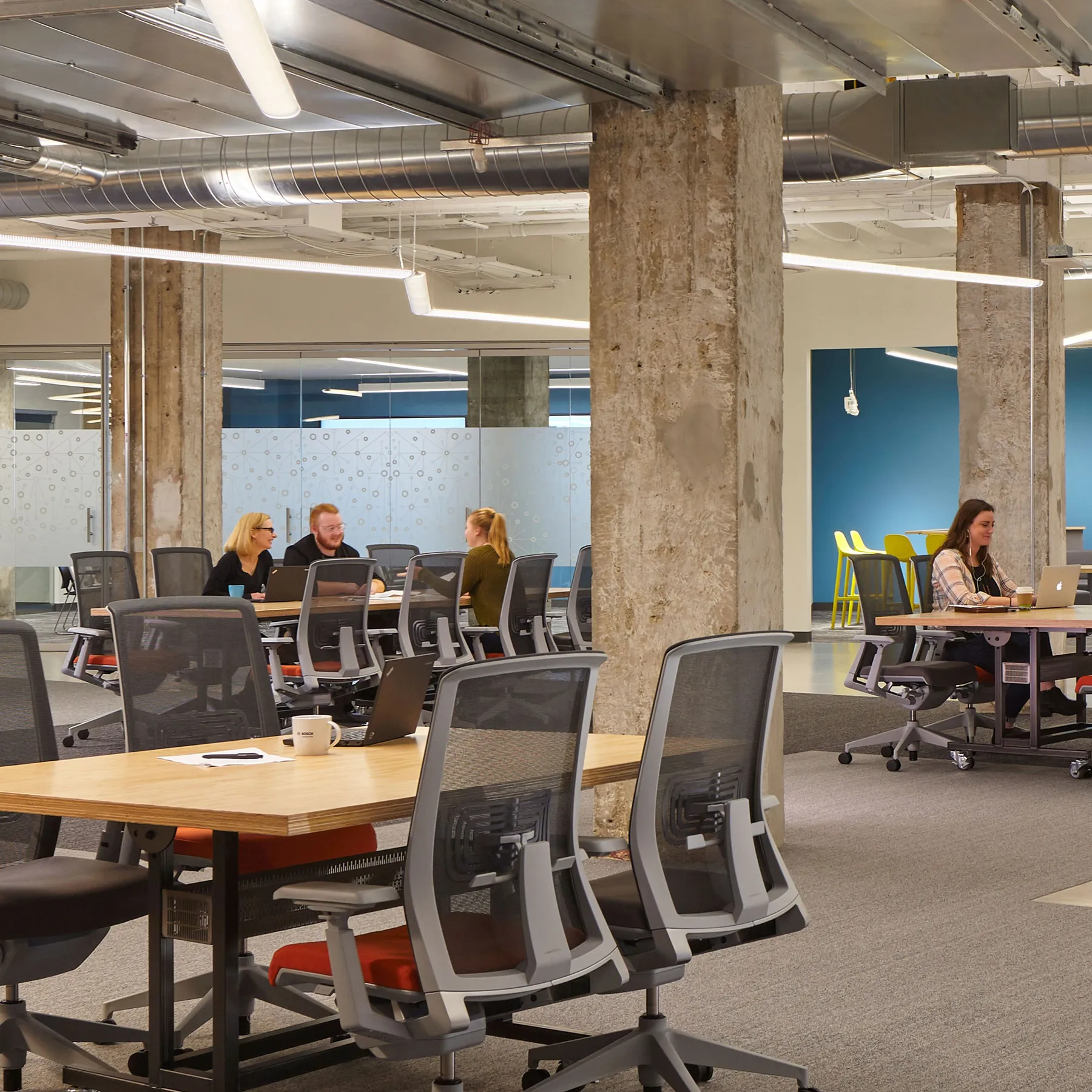 custom community table veneer on casters by Icon Modern