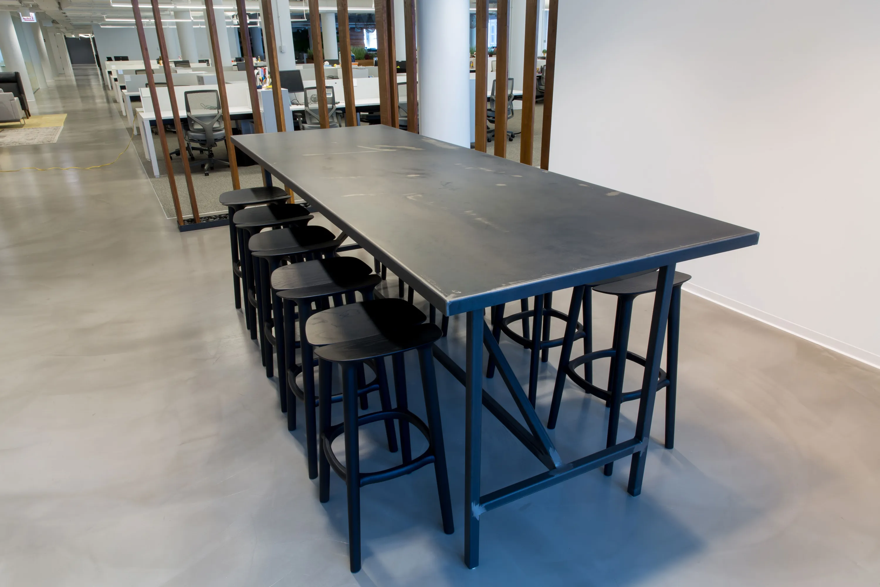 custom community table in steel by Icon Modern