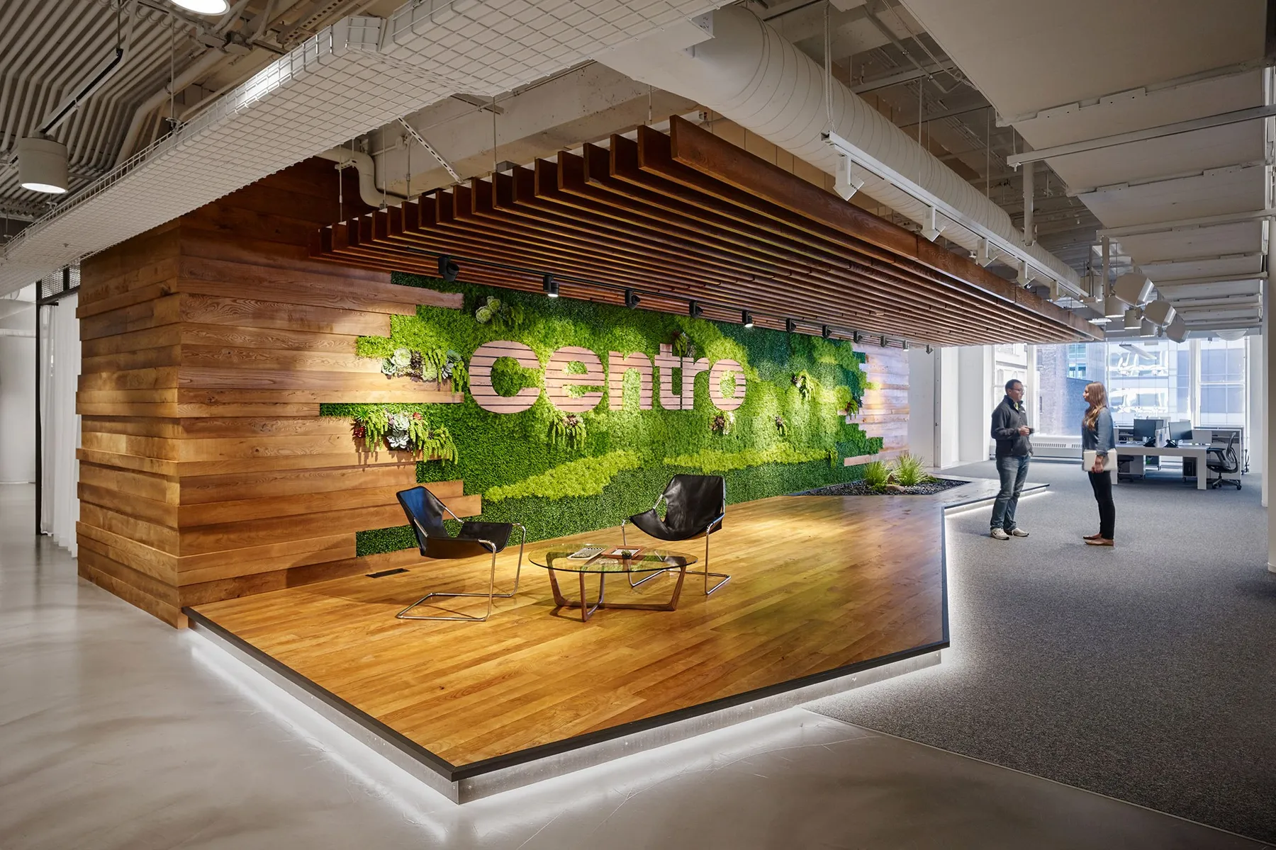 custom cladding in urban ash with wall signage by Icon Modern