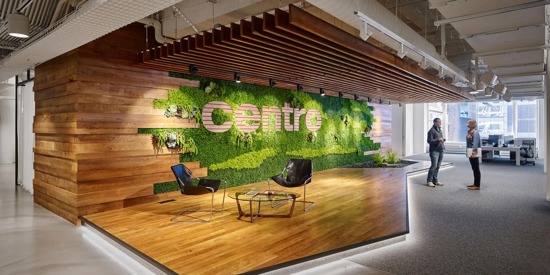 custom cladding in urban ash with wall signage by Icon Modern