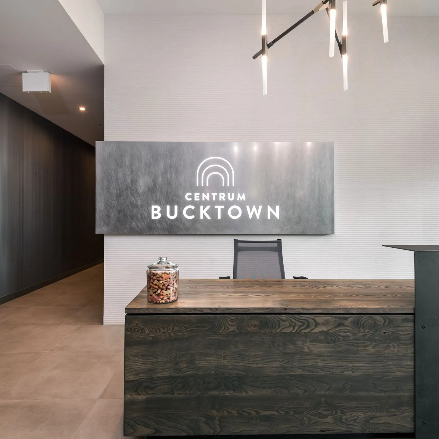 custom reception desk urban ash with steel transaction element by Icon Modern