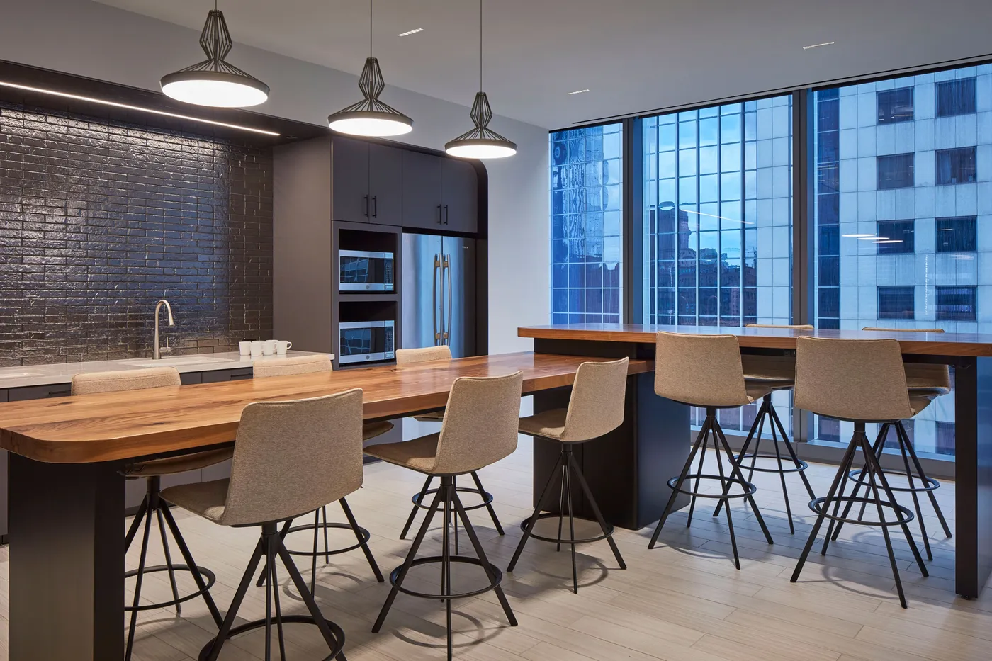 custom walnut table in L-shaped design by Icon Modern