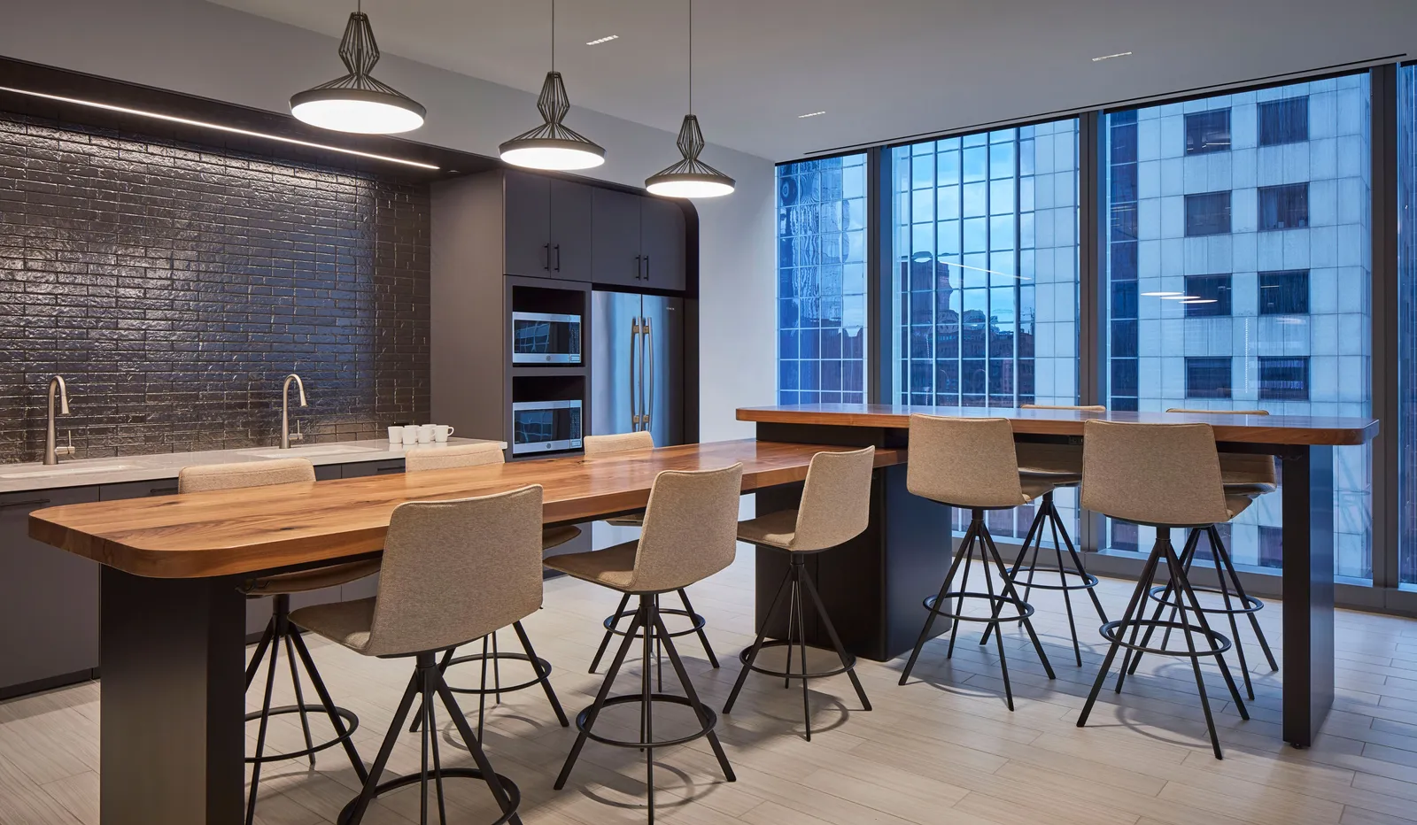 custom walnut table in L-shaped design by Icon Modern
