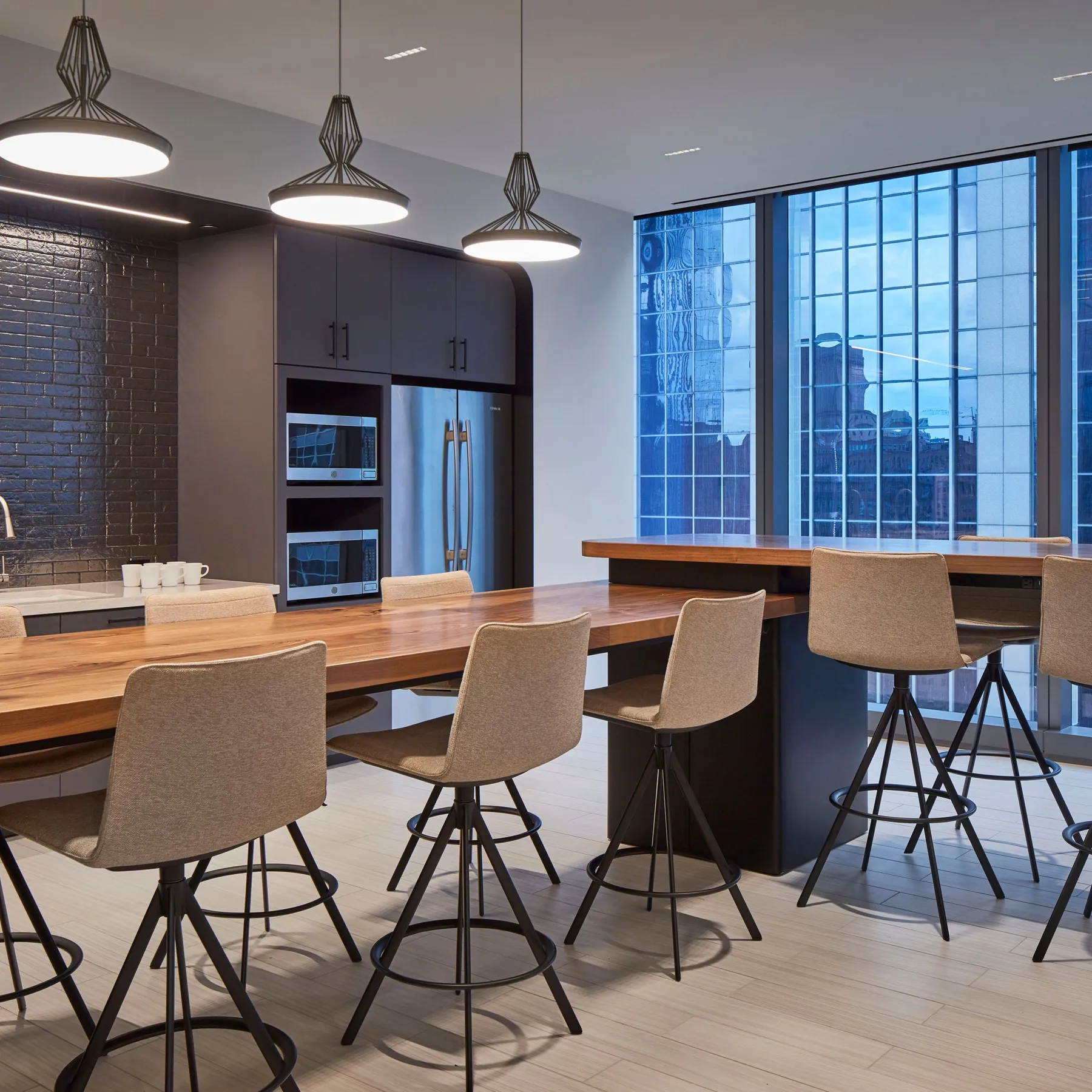 custom walnut table in L-shaped design by Icon Modern