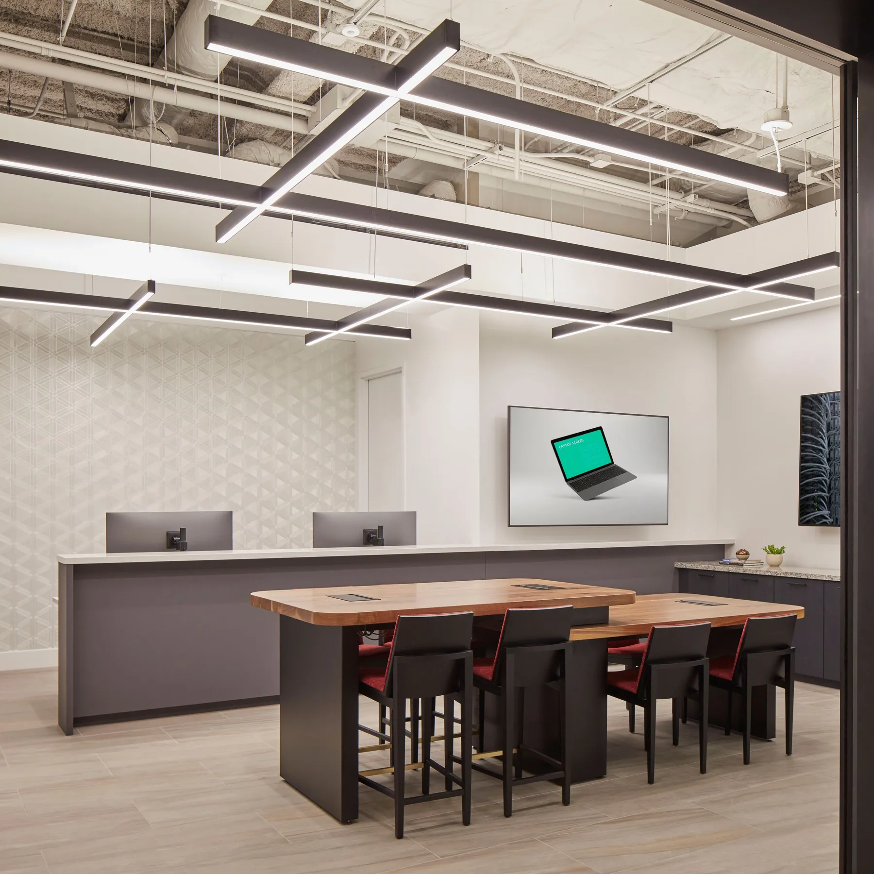 custom walnut conference table with two-tier tops and power integration by Icon Modern