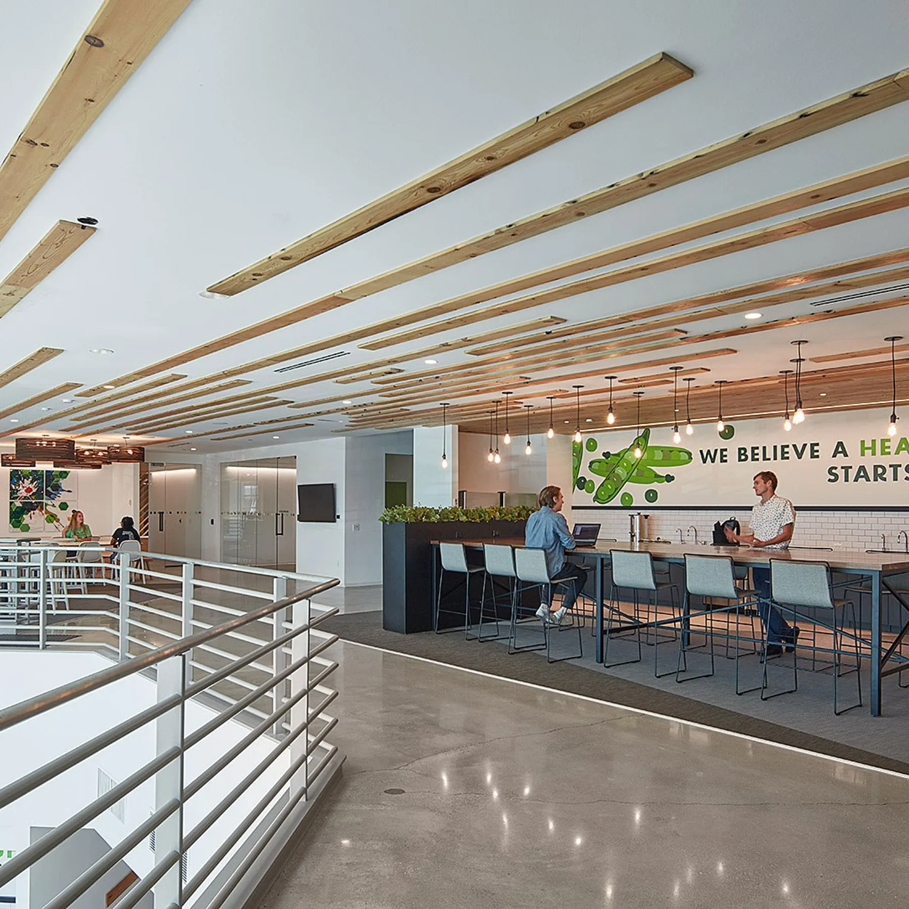 custom community table in walnut with steel planter