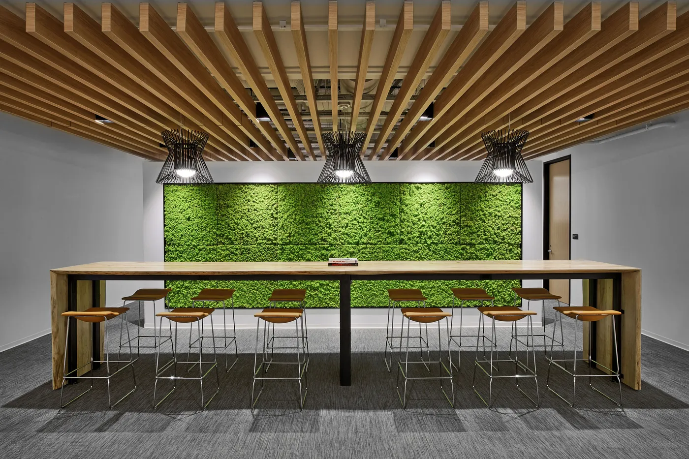 custom community table with waterfall dropsides by Icon Modern