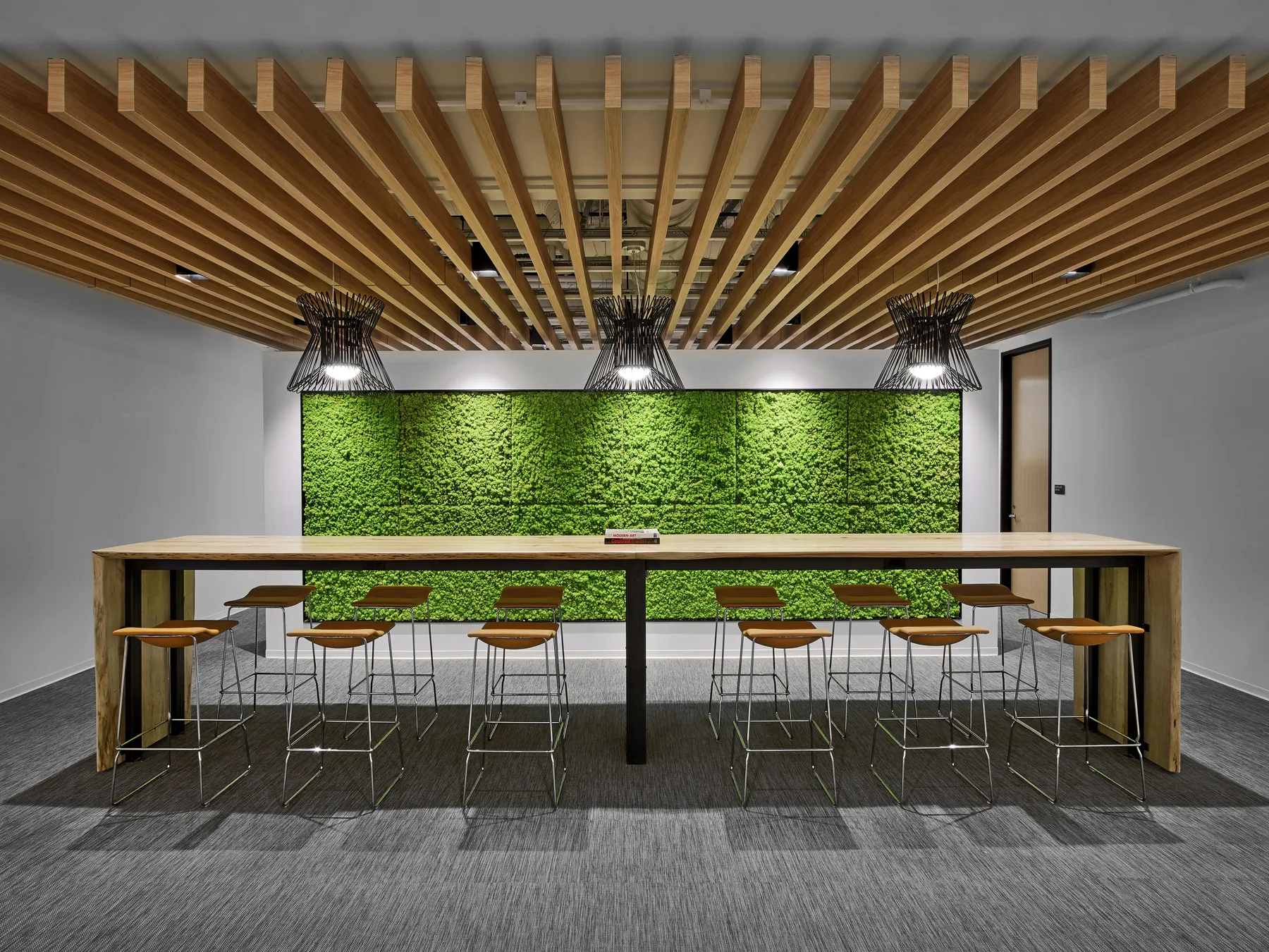 custom community table with waterfall dropsides by Icon Modern