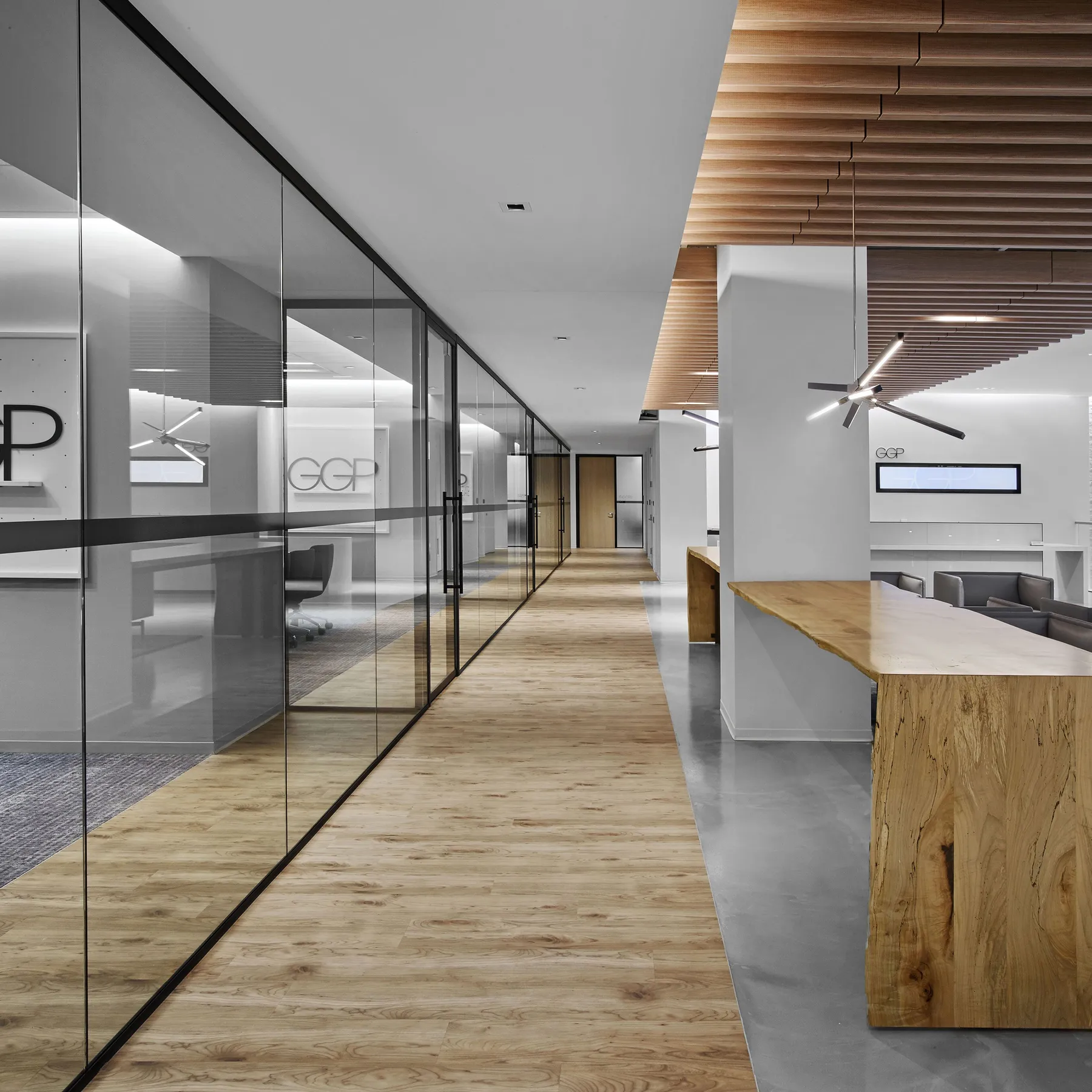 custom community table with waterfall dropside by Icon Modern