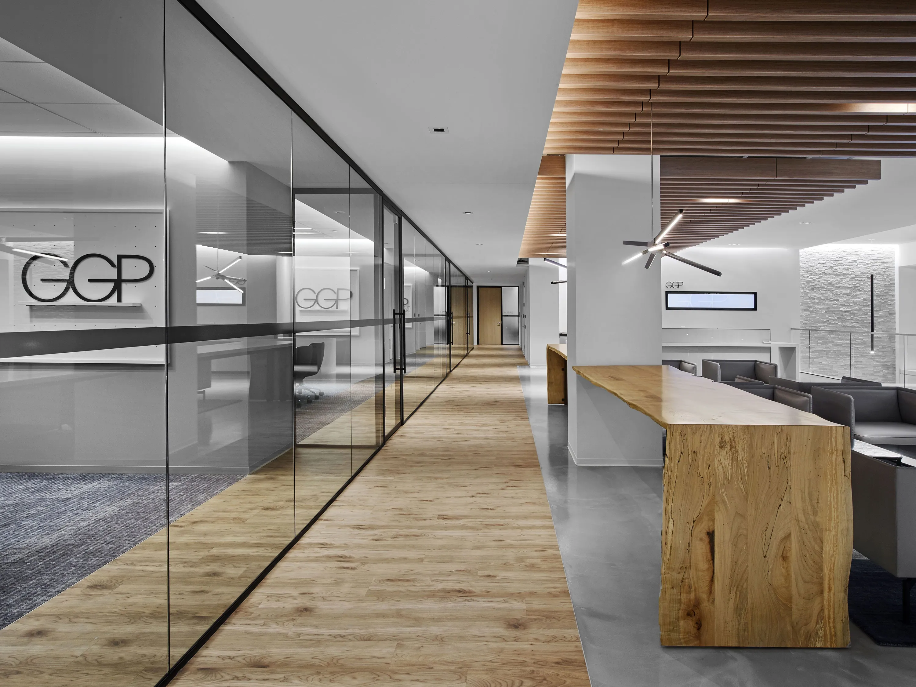 custom community table with waterfall dropside by Icon Modern