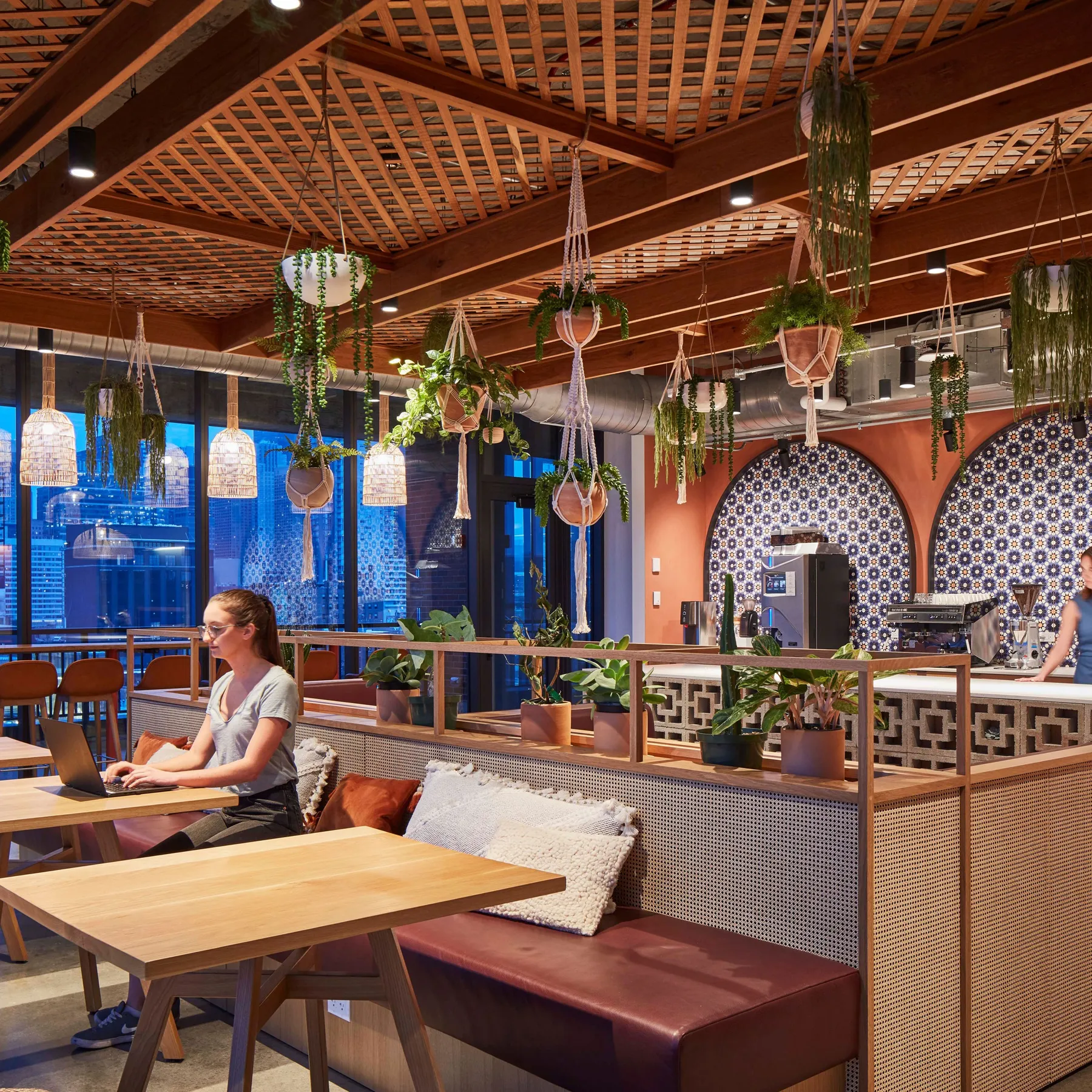 custom cafe tables in urban oak and oak ceiling plant trellis by Icon Modern