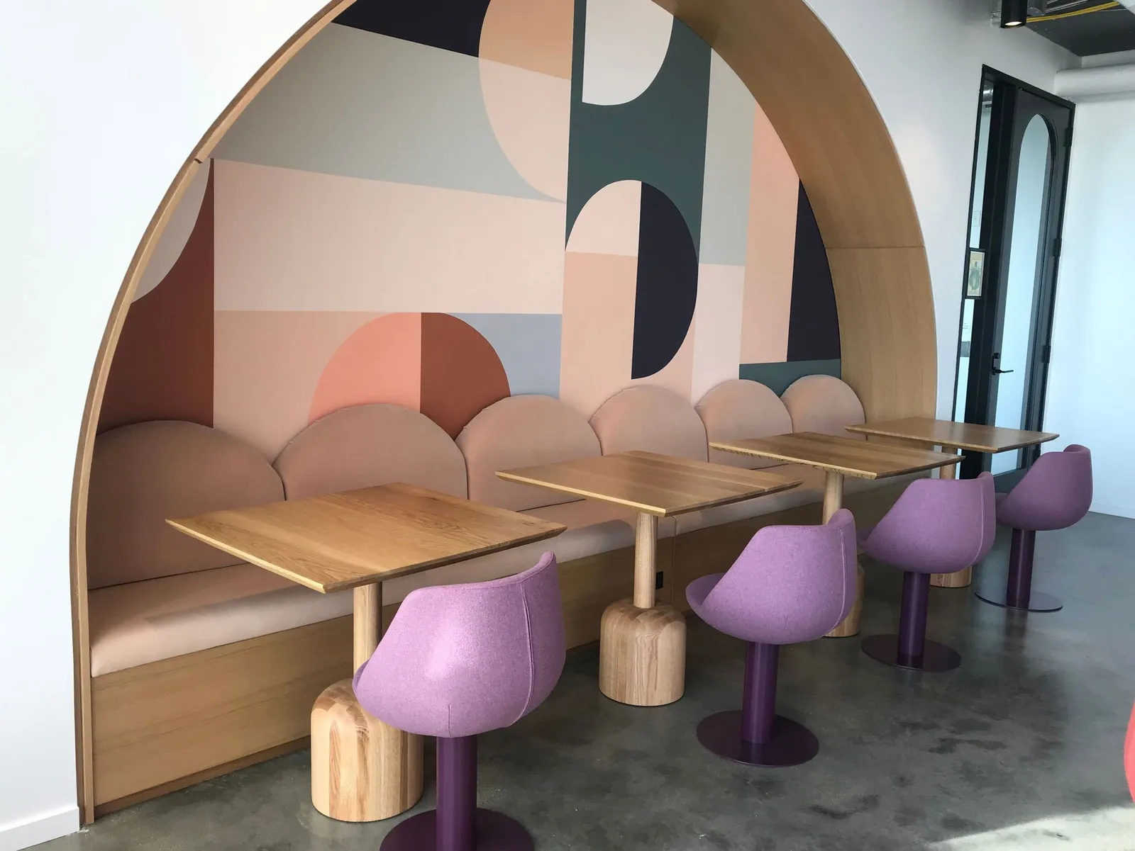 custom cafe tables in urban oak with turned bases by Icon Modern