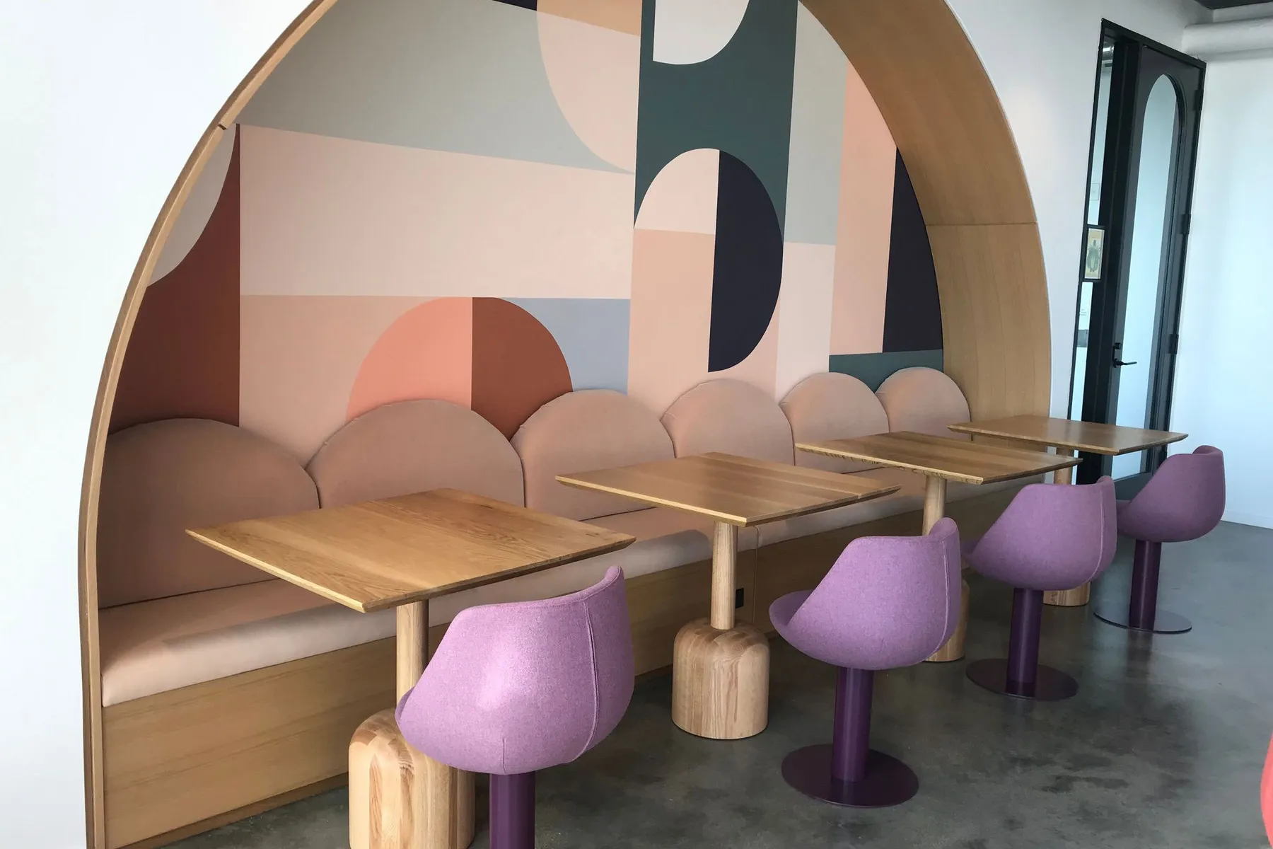 custom cafe tables in urban oak with turned bases by Icon Modern