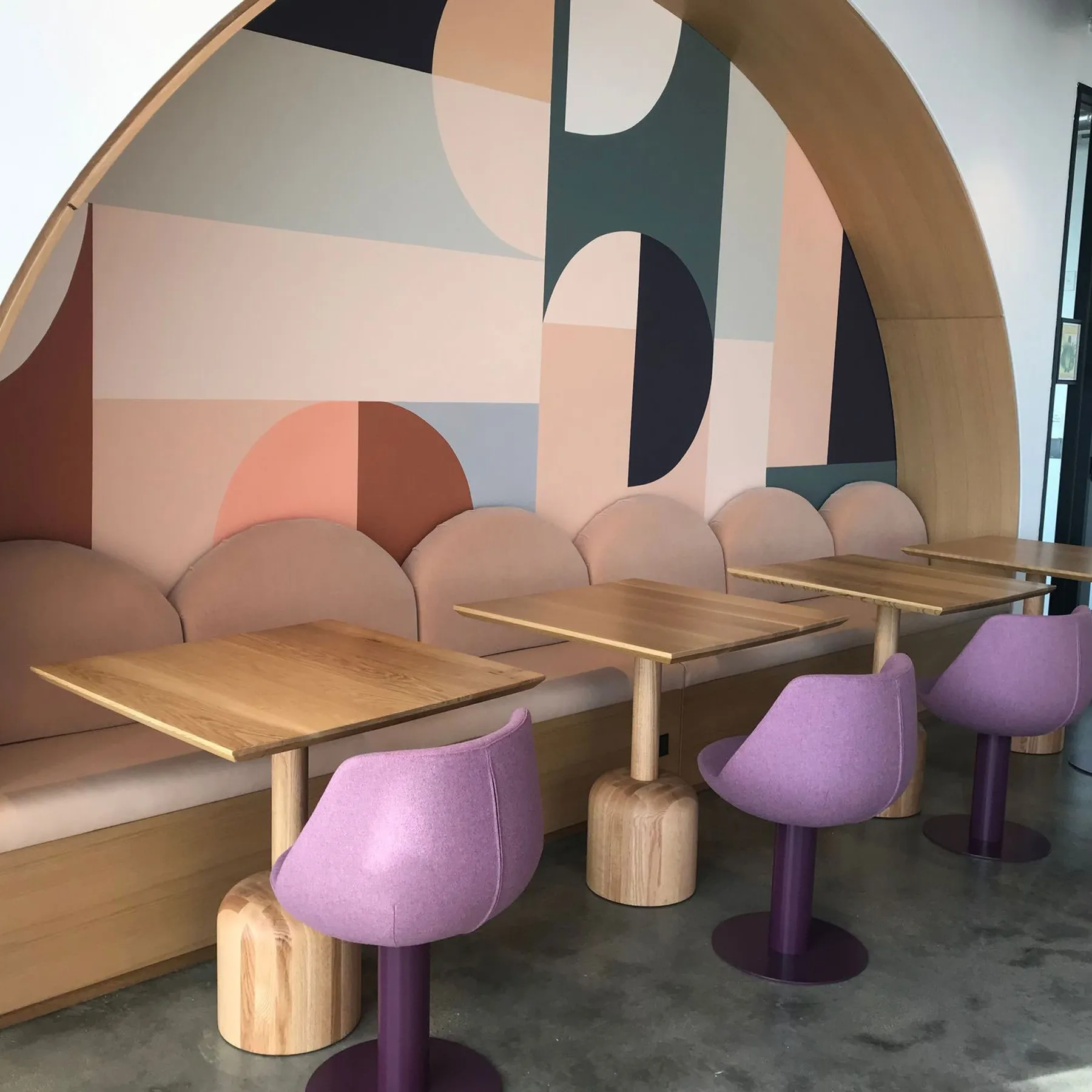 custom cafe tables in urban oak with turned bases by Icon Modern