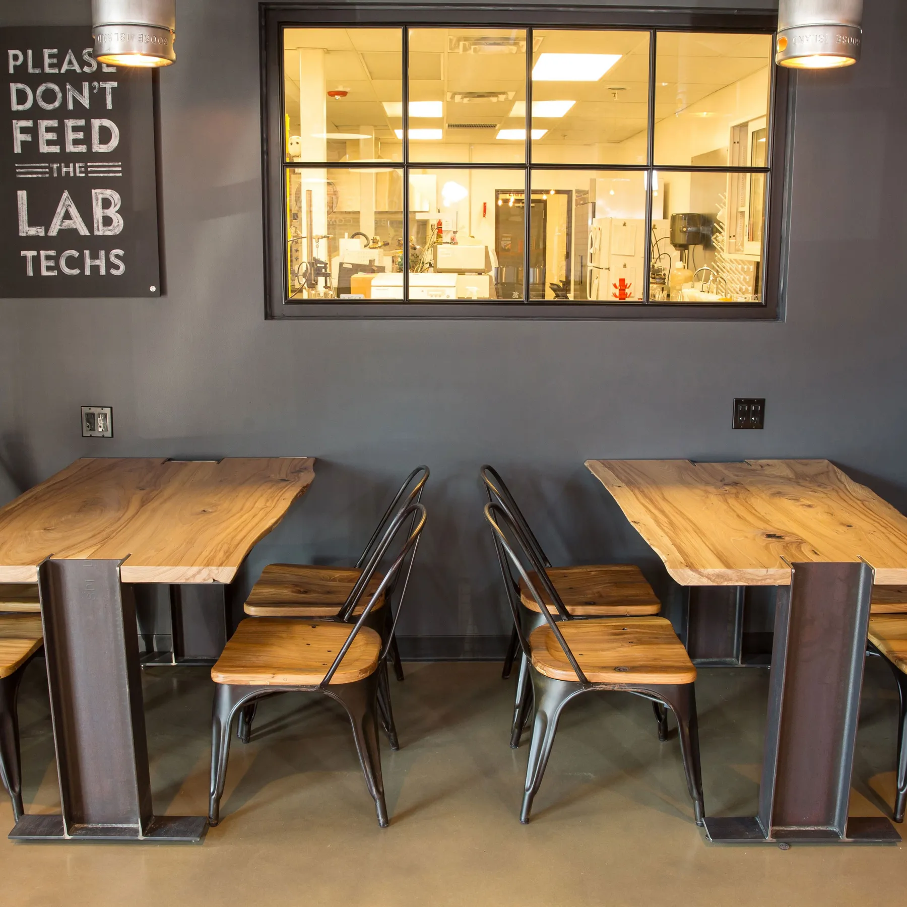 custom cafe tables with i-beam steel bases by Icon Modern