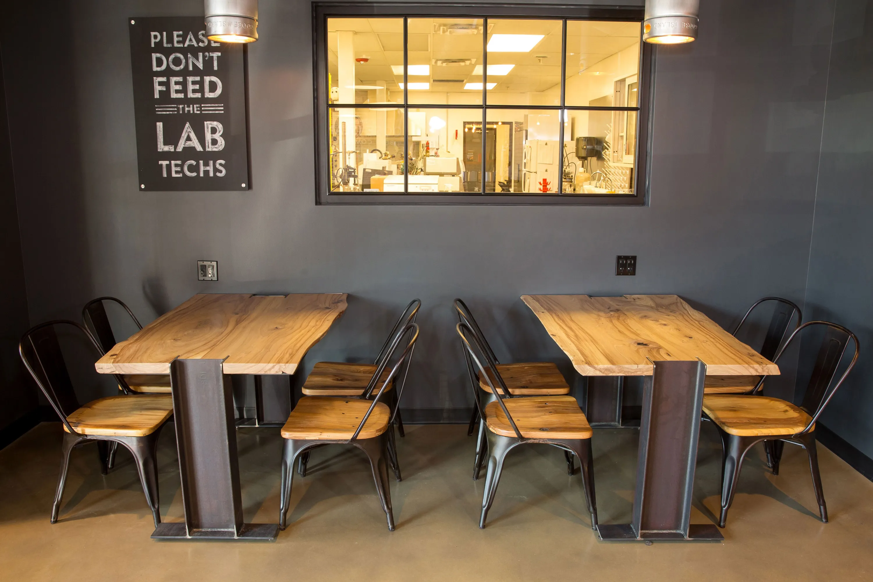 custom cafe tables with i-beam steel bases by Icon Modern