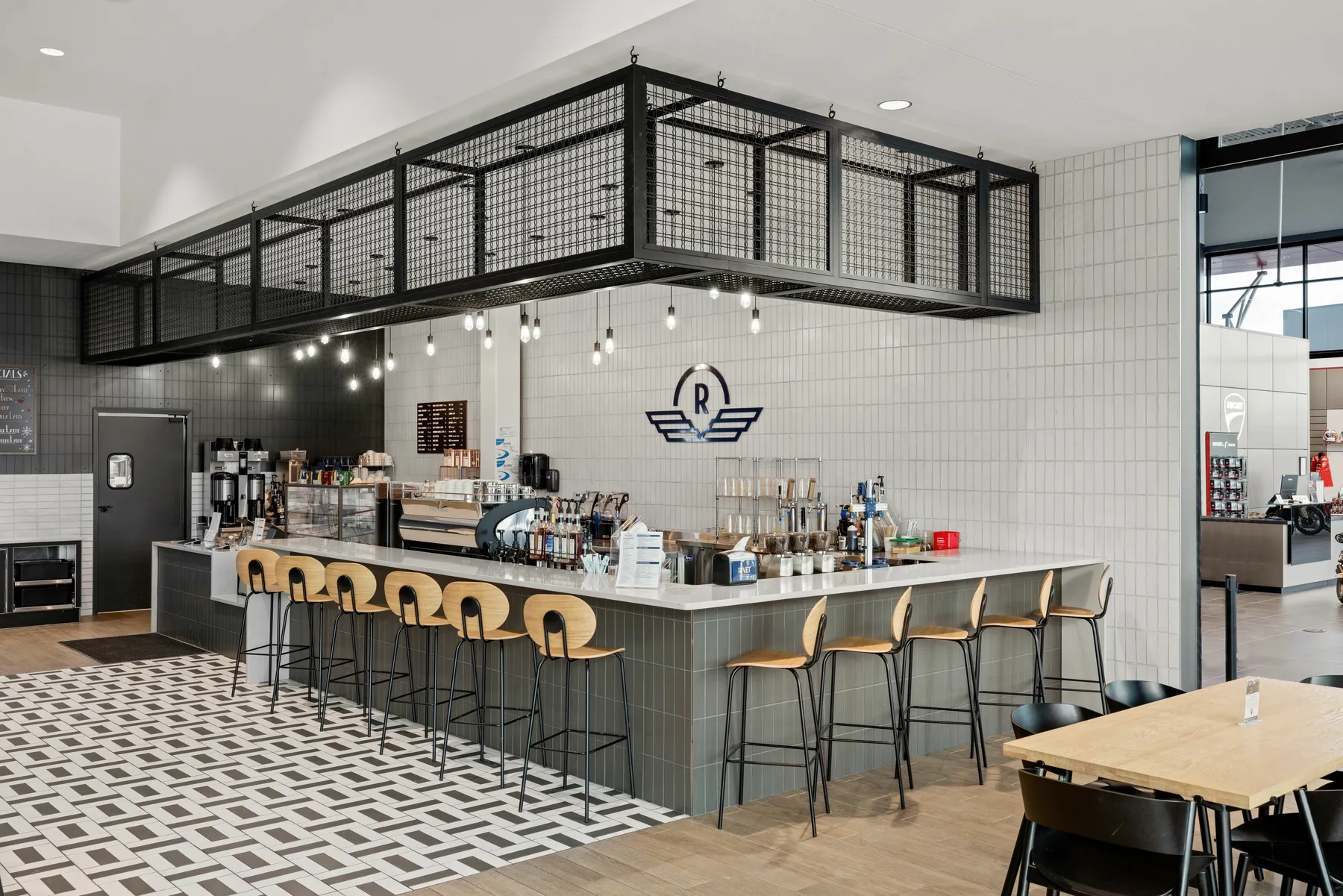 custom ceiling element in L-shape with steel tube and wire mesh infill by Icon Modern