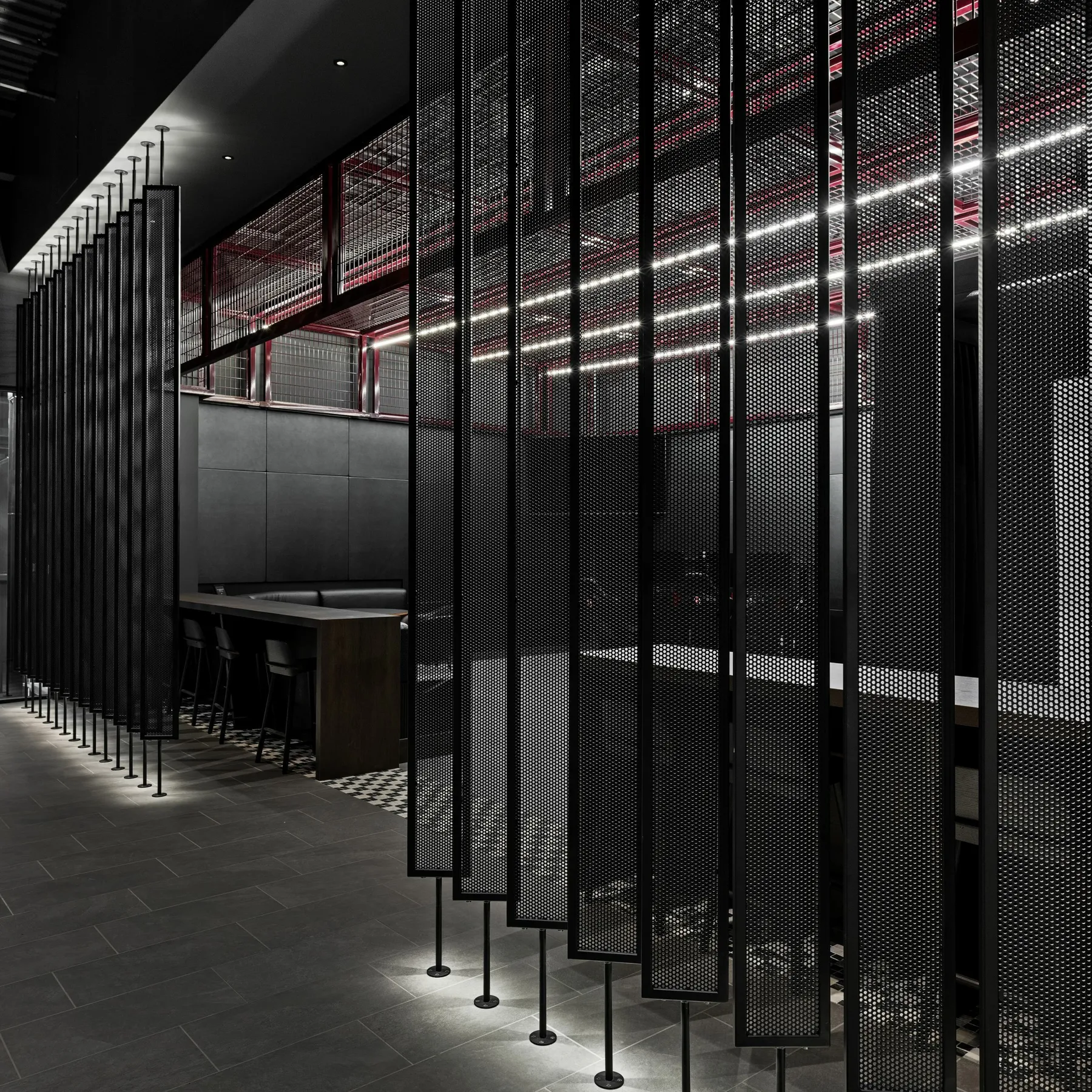 custom space dividers with steel tube frame and perforated infill by Icon Modern