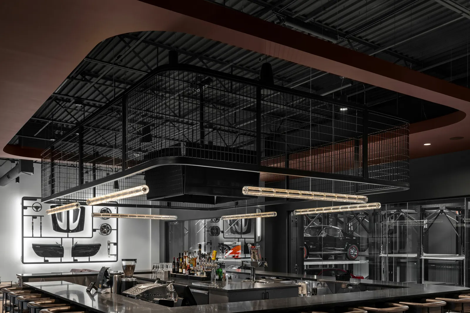 custom ceiling element in steel and wire mesh infill by Icon Modern