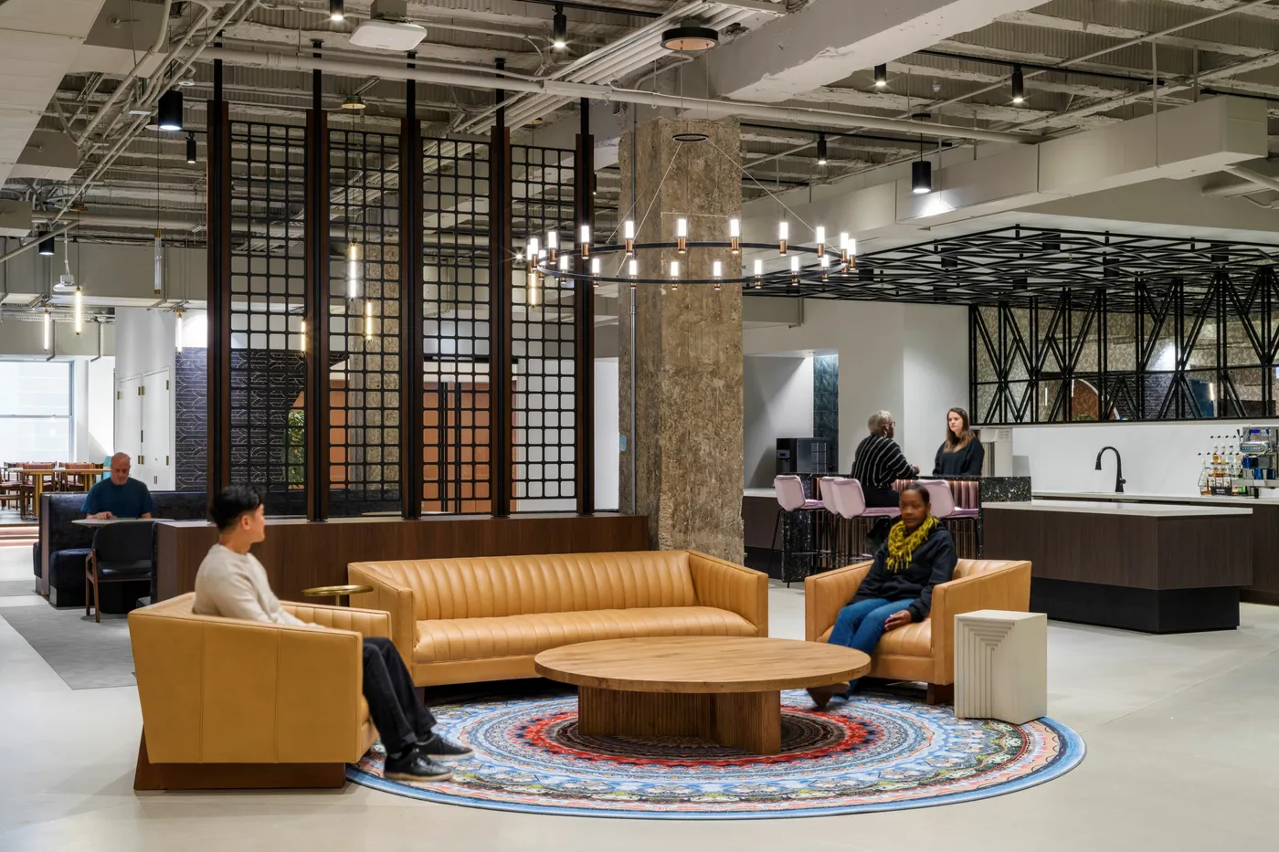 custom space divider with laser cut metal grid and wood trim by Icon Modern