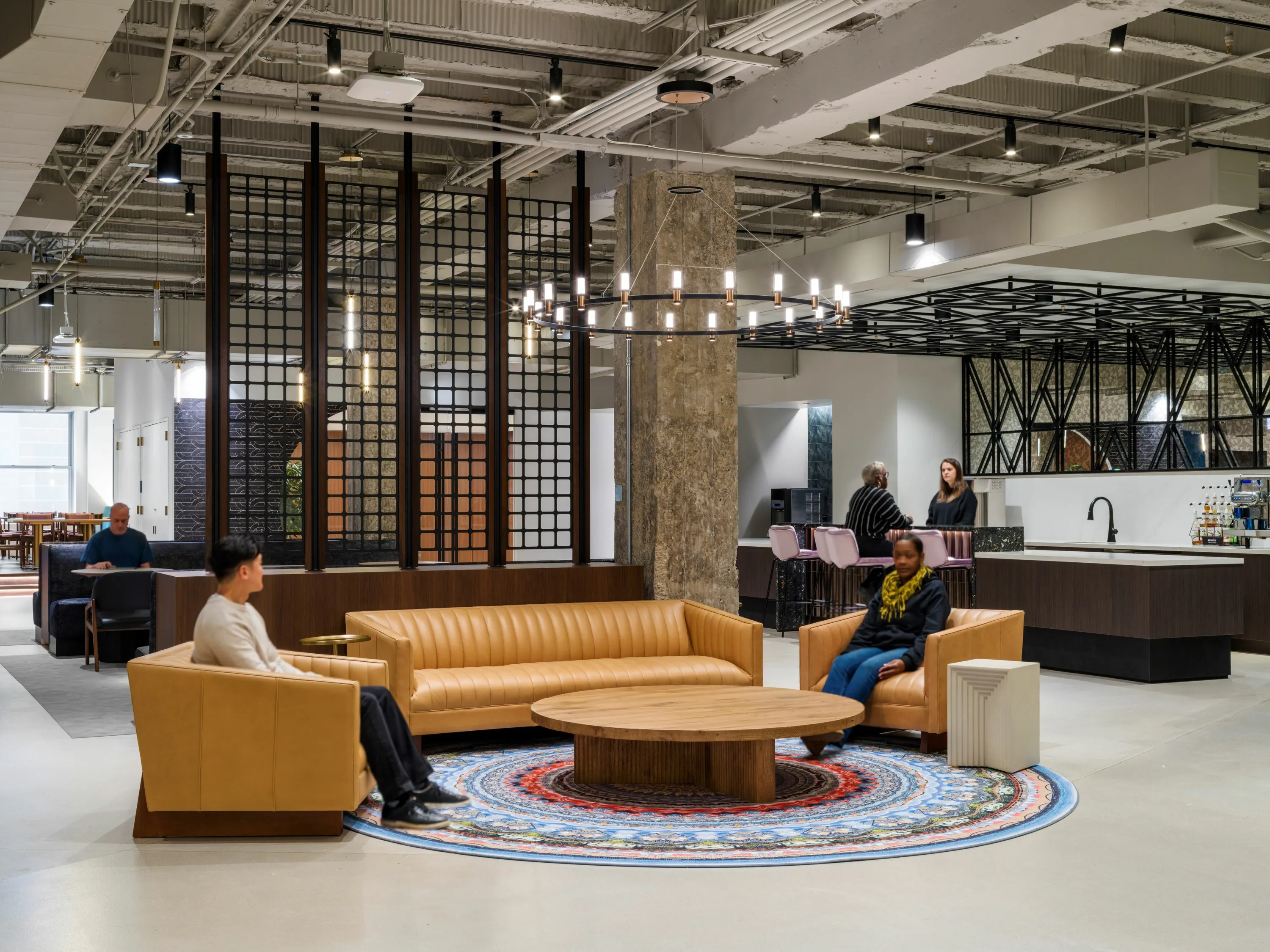 custom space divider with laser cut metal grid and wood trim by Icon Modern