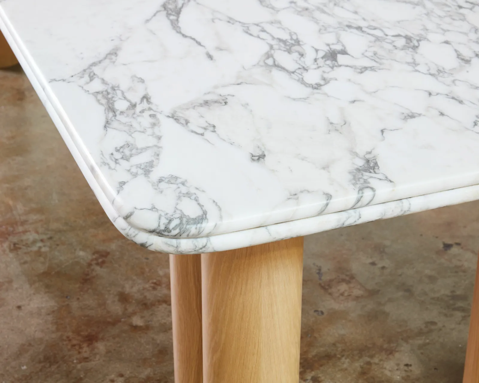 custom stone table with double bullnose edge profile by Icon Modern