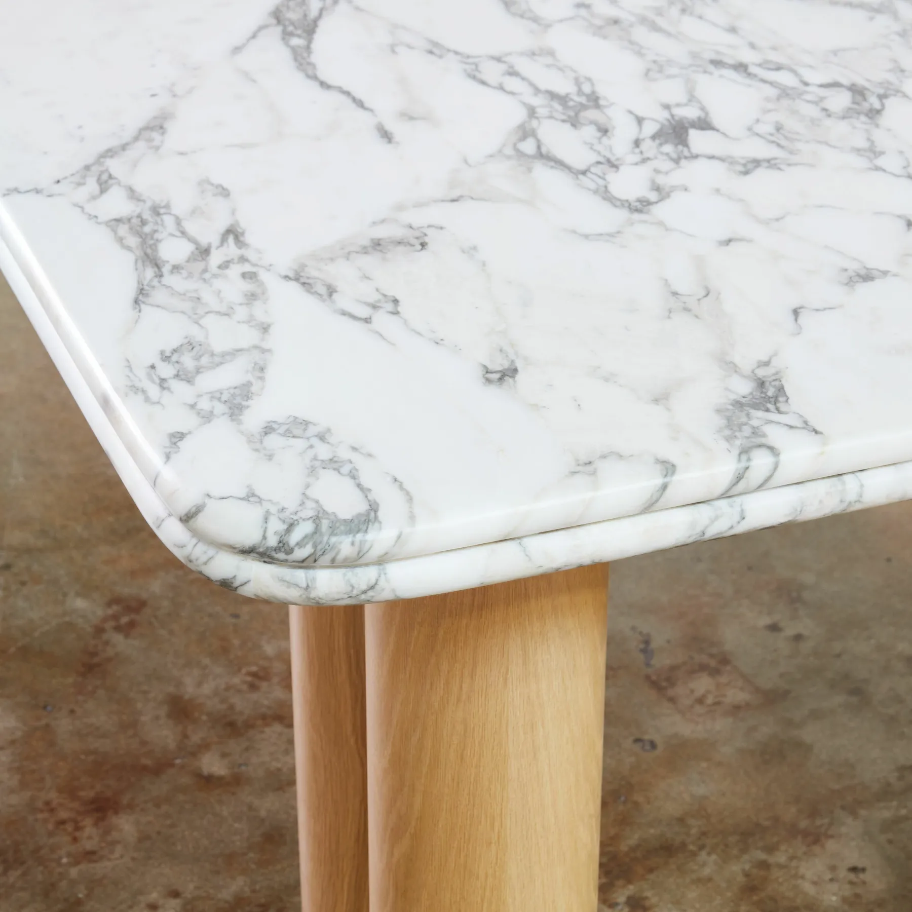 custom stone table with double bullnose edge profile by Icon Modern