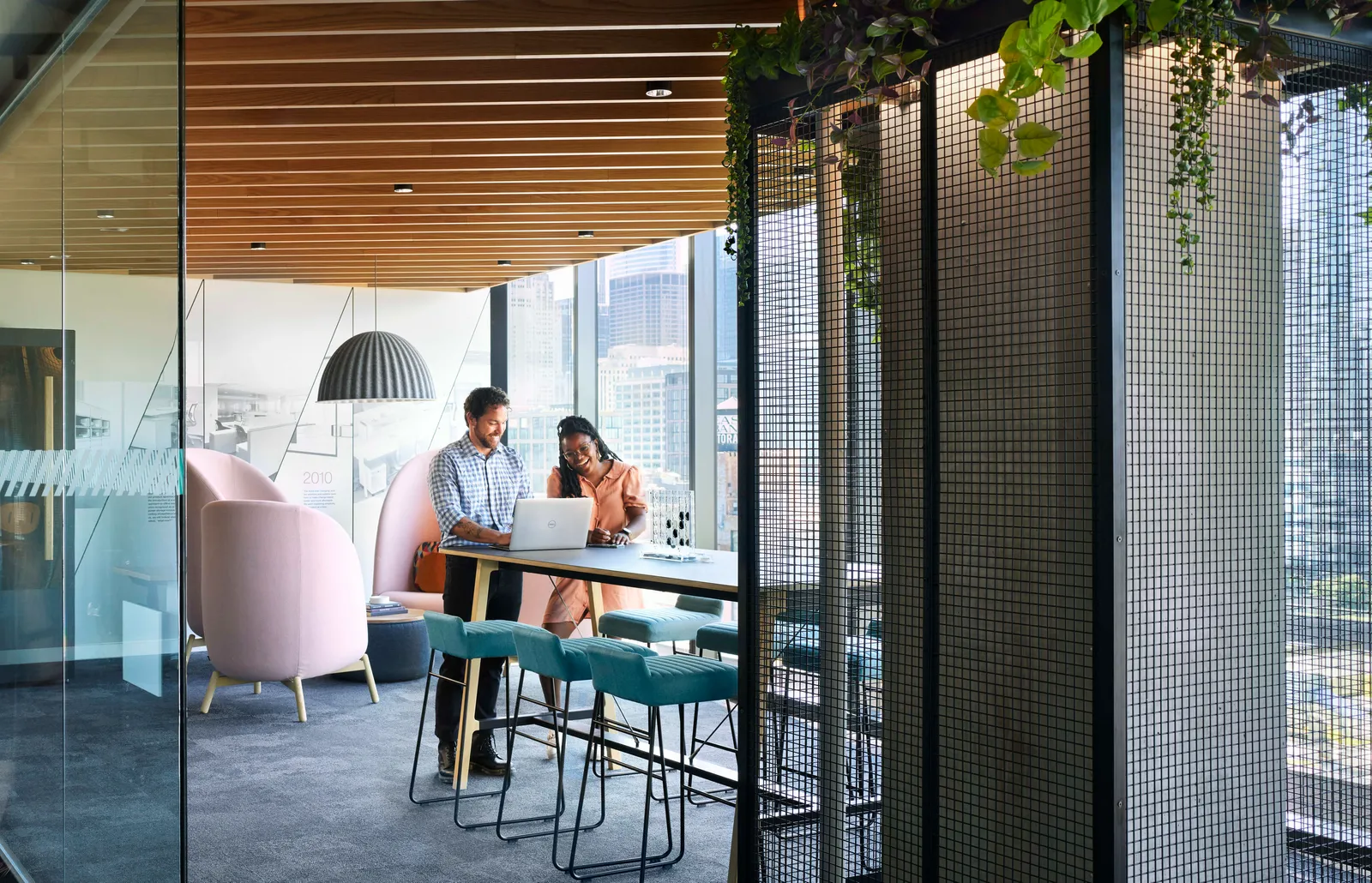 custom steel column covers with metal mesh infill by Icon Modern